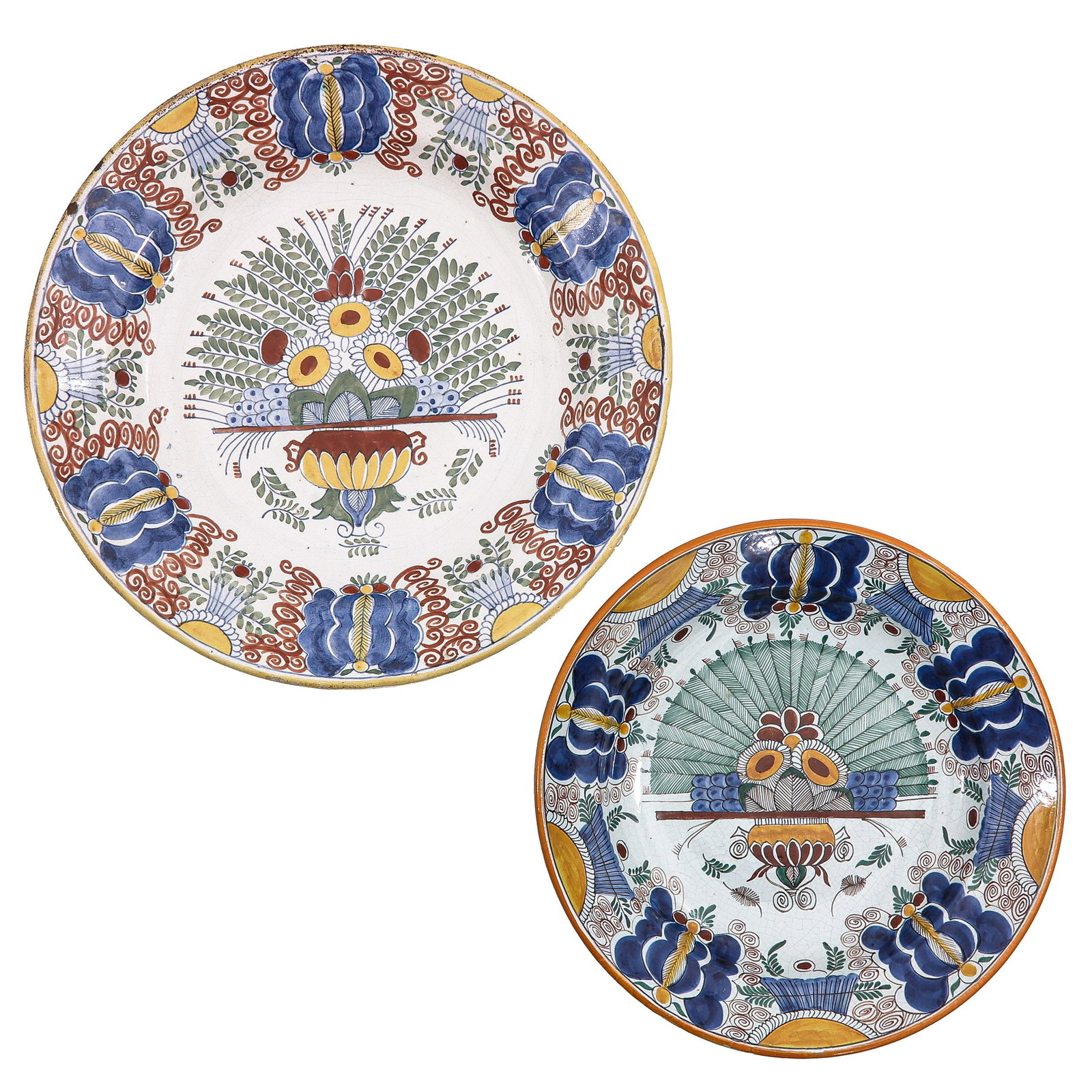 A Lot of 2 Polychrome Plates: consisting of 2 polychrome plates with floral decoration, largest 35 cm, chip