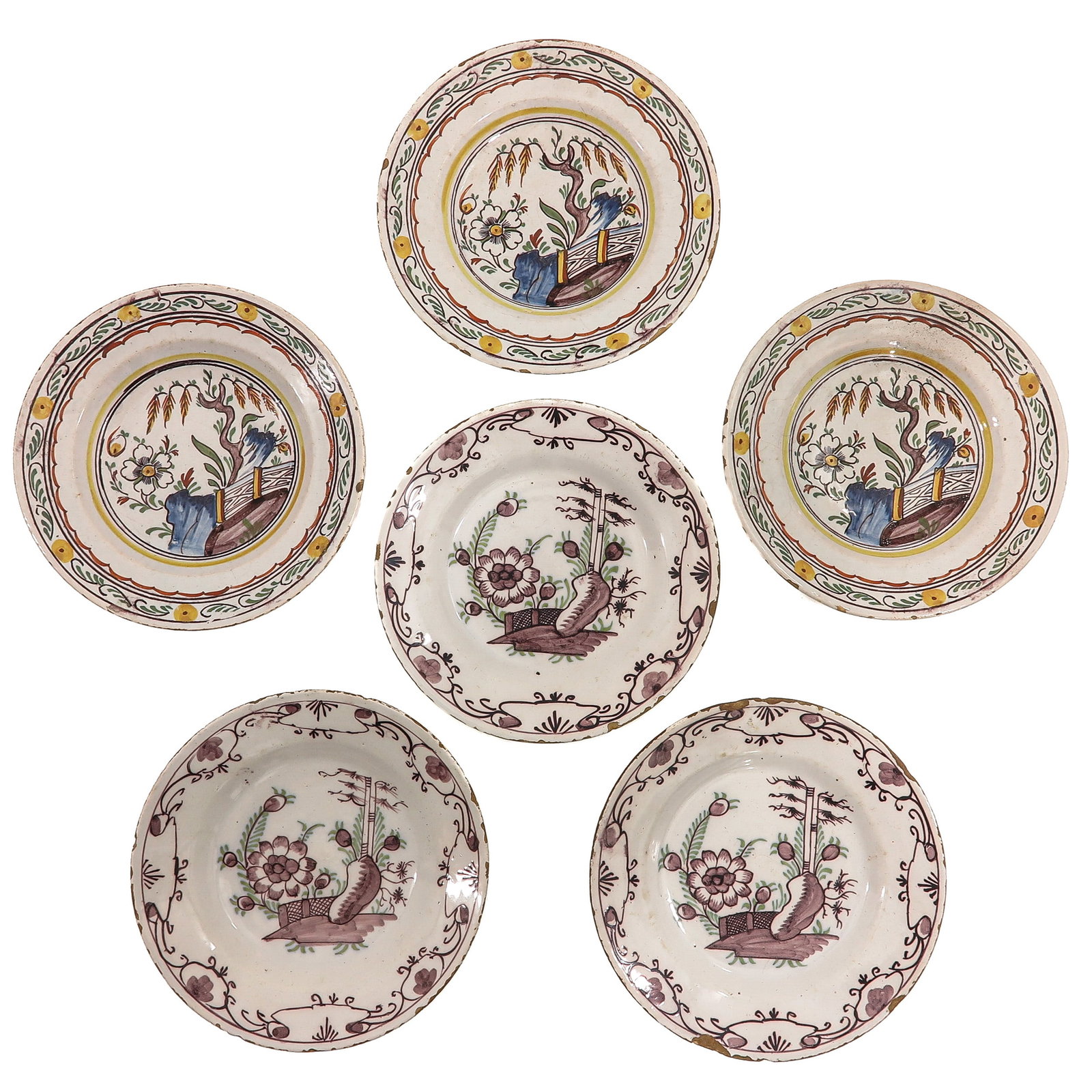 A Group of 6 Plates: consisting of 6 plates, polychrome, with a depiction of floral decoration in a garden, ca. 1780, diameter 23 cm