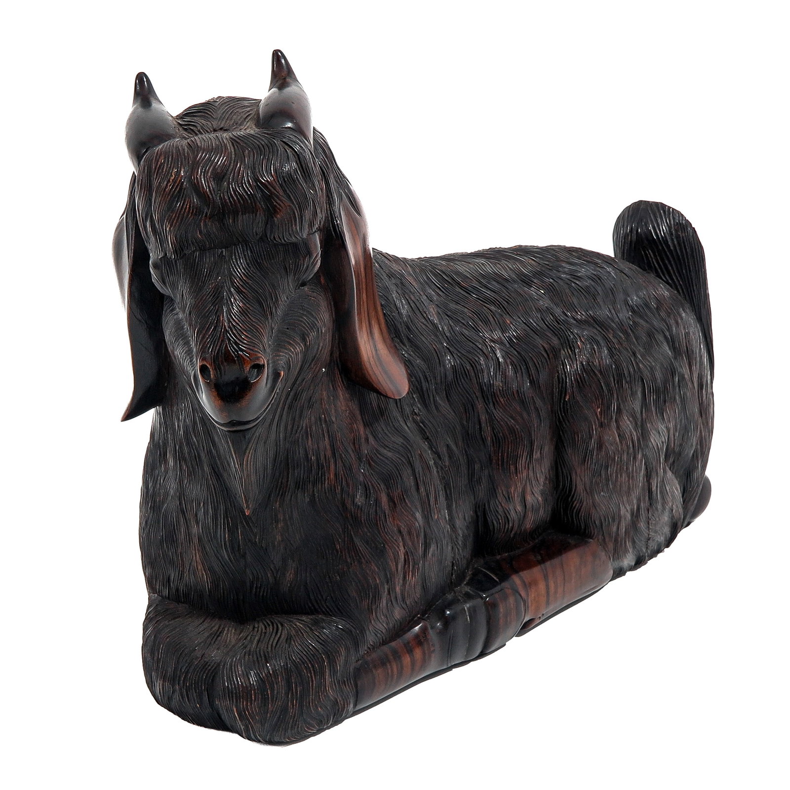 A Carved Wood Sculpture: depicting an Angora goat, Coromandel wood, ca. 1900, very finely carved, 33 x 28 cm