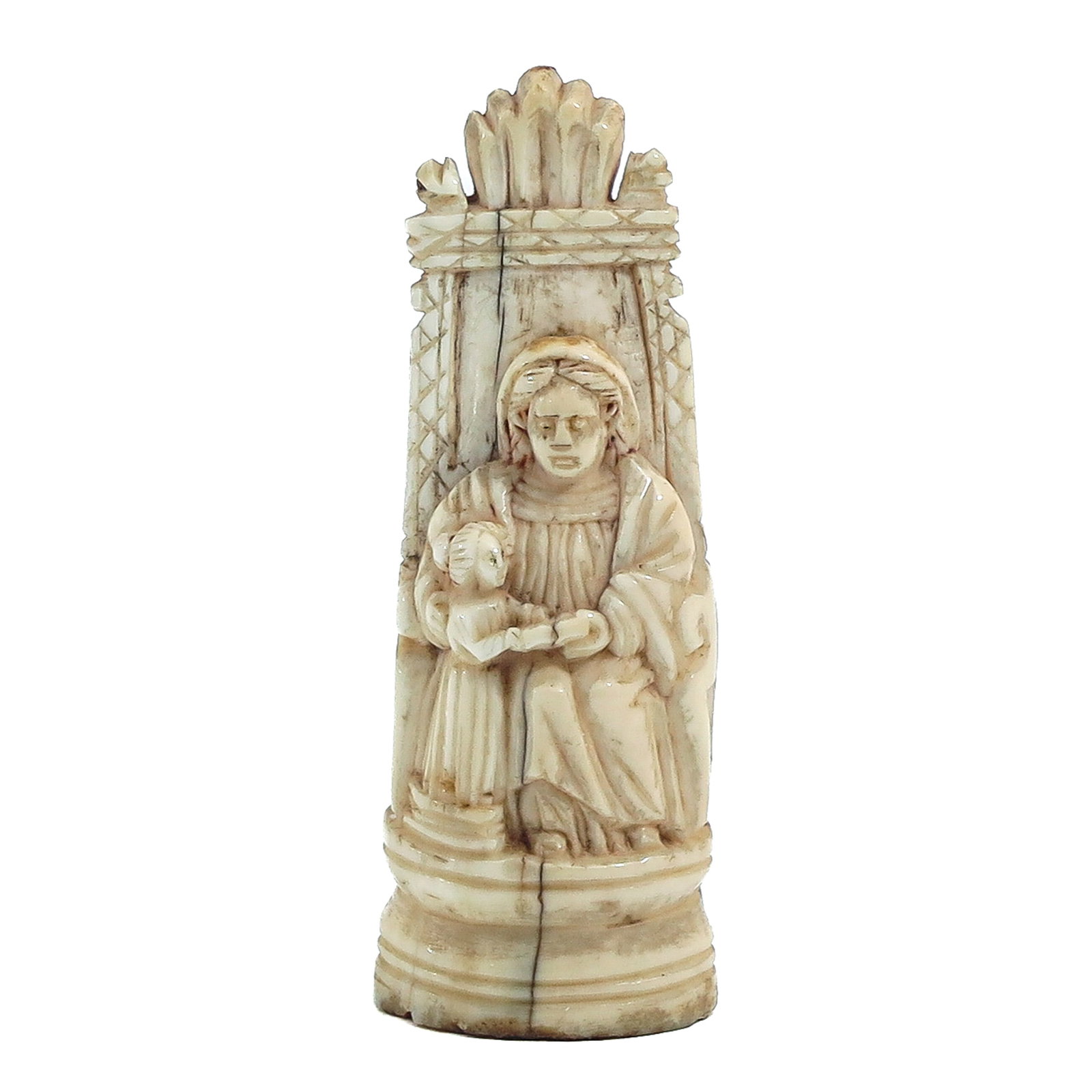 A Sperm Whale Tooth: carved, with a depiction of Saint Anne with the young Mary, later mother of Christ, Portuguese, ca. 1600, height 9 cm