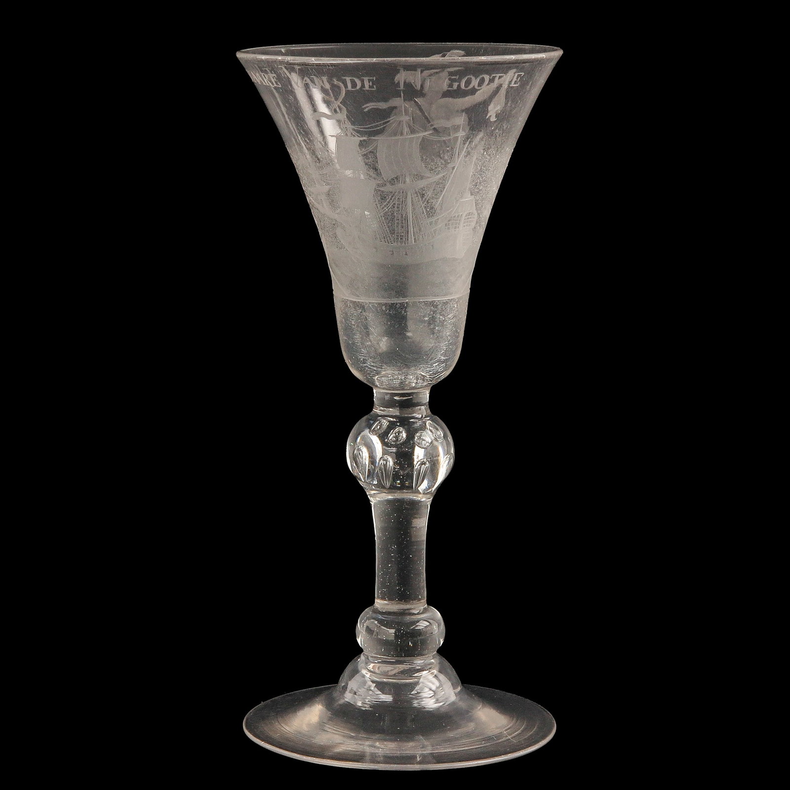 An 18th Century Engraved Glass: England, 18th century, engraved “t, WELVAARE VAN DE NEGOOTIE”, height 19 cm