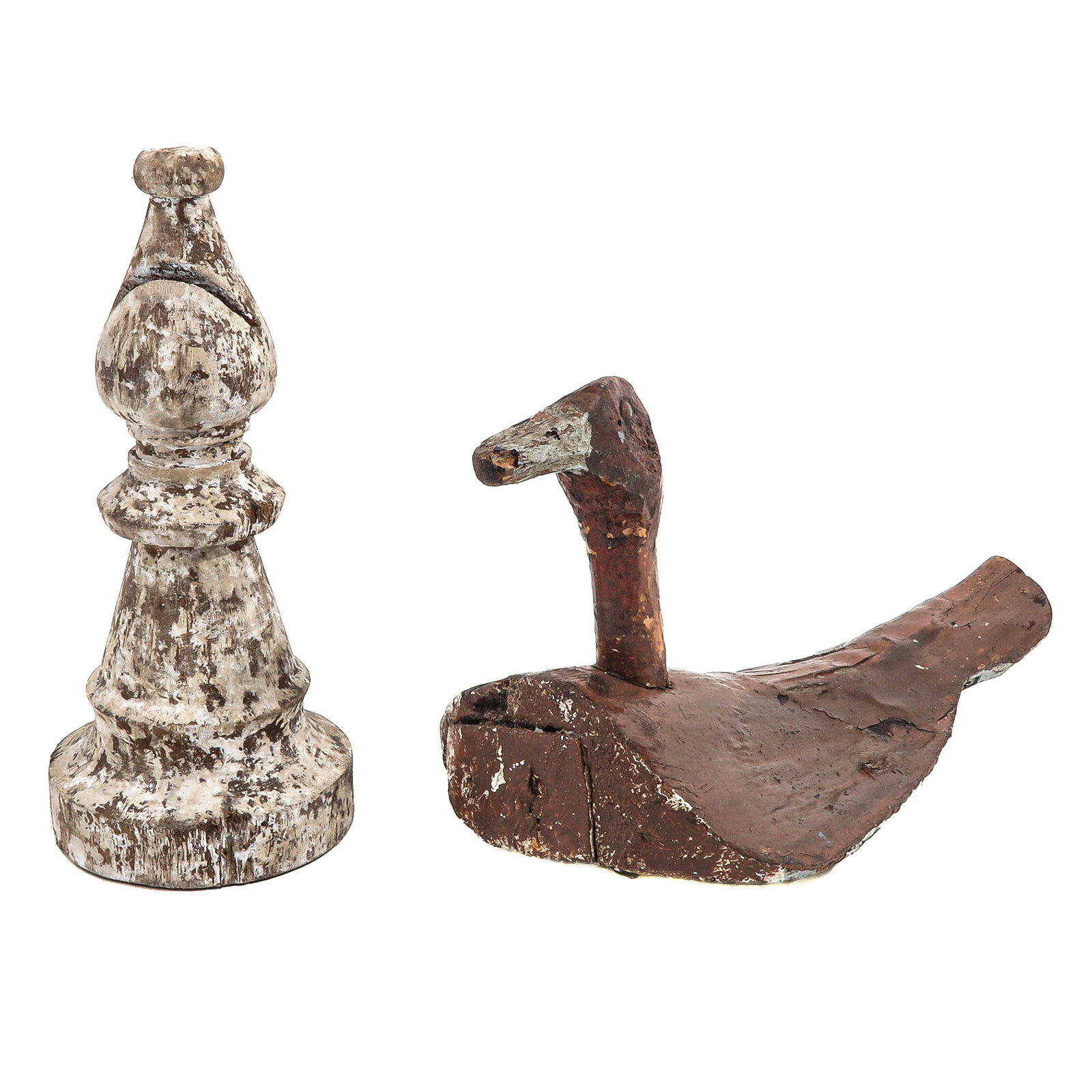 A Diverse Lot: consisting of a large chess piece in the shape of a bishop, height 31 cm, and a wooden decoy duck, length 43 cm