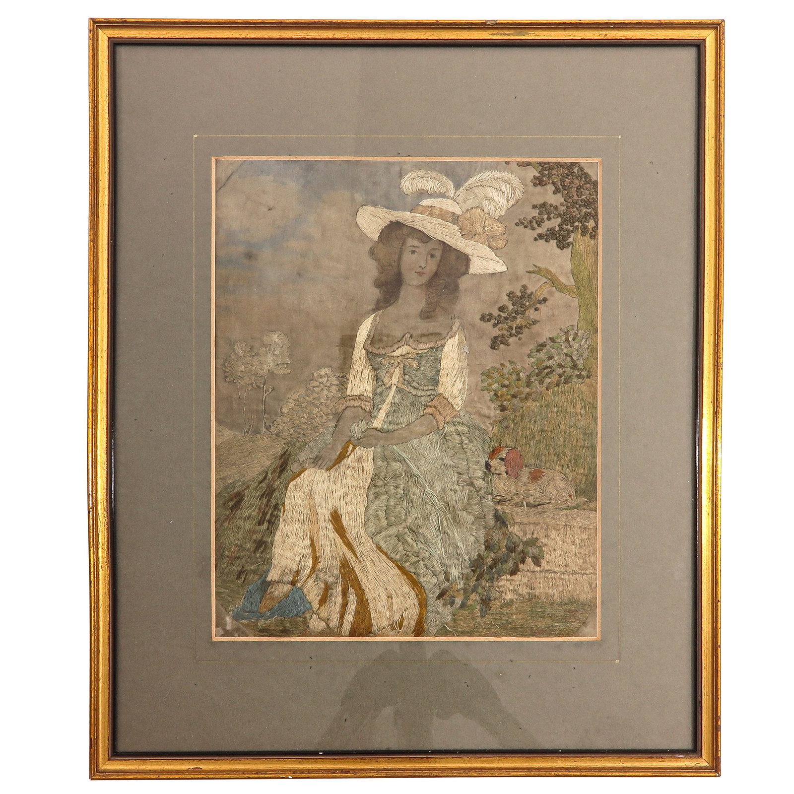 A Silk Embroidered Frame: with embroidery on silk, depiction of a lady in a landscape, 20 x 25 cm