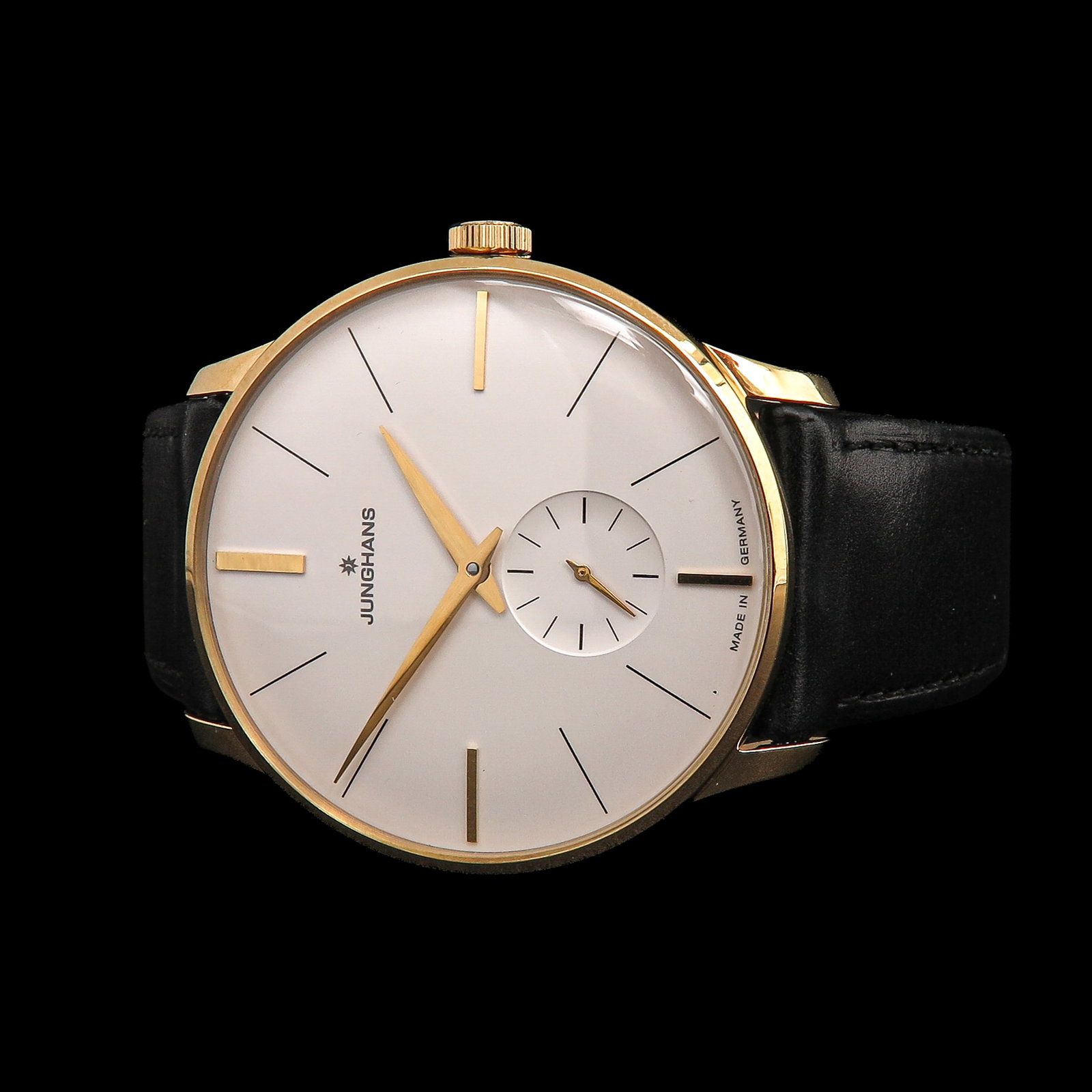 A Mens Junghans Meister Watch: Junghans Meister, hand-wound, gold-plated, with black strap, No. 00507, case diameter 38 mm