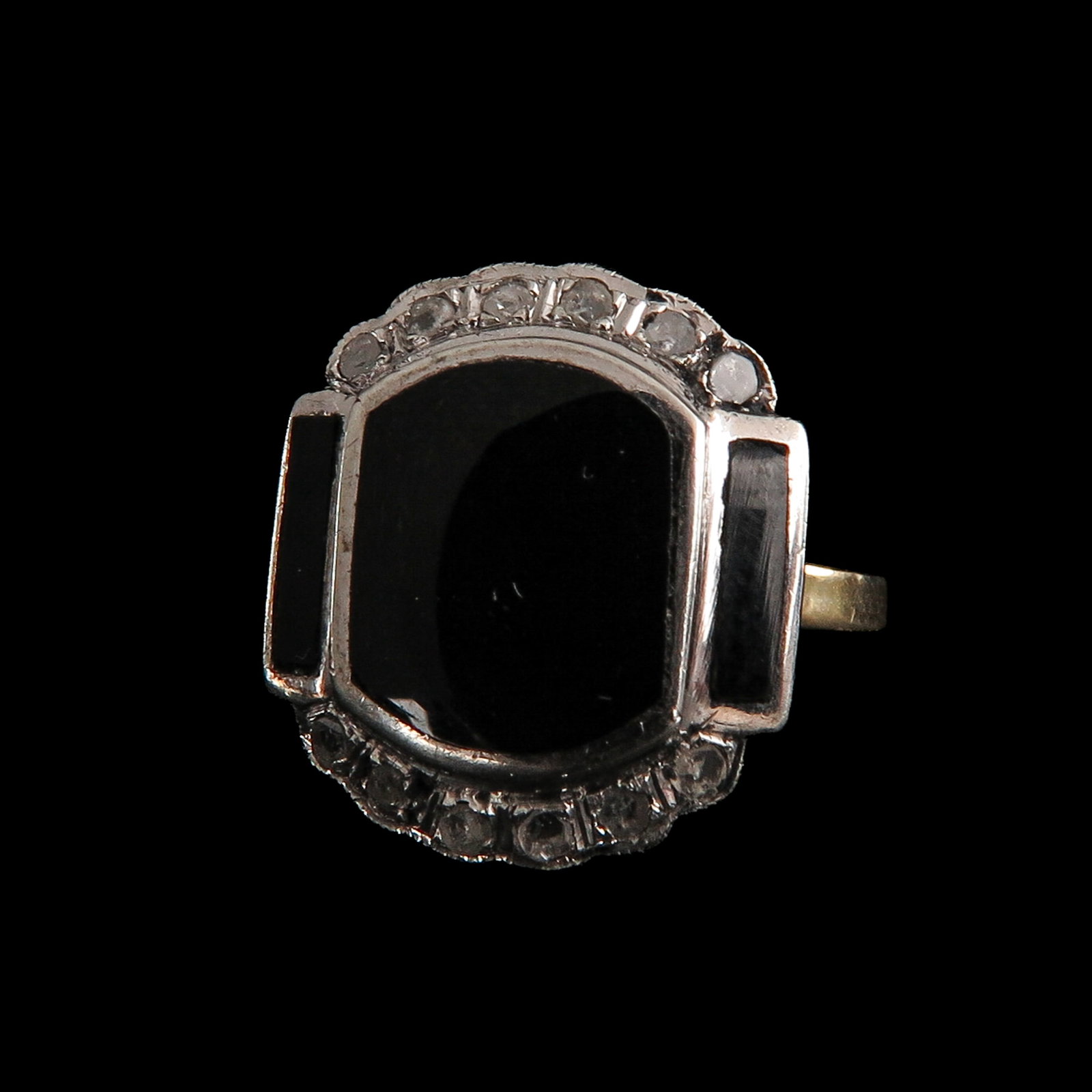 A Ladies Enamel and Diamond Ring: gold and silver, with black enamel and diamonds, ring size 16.5