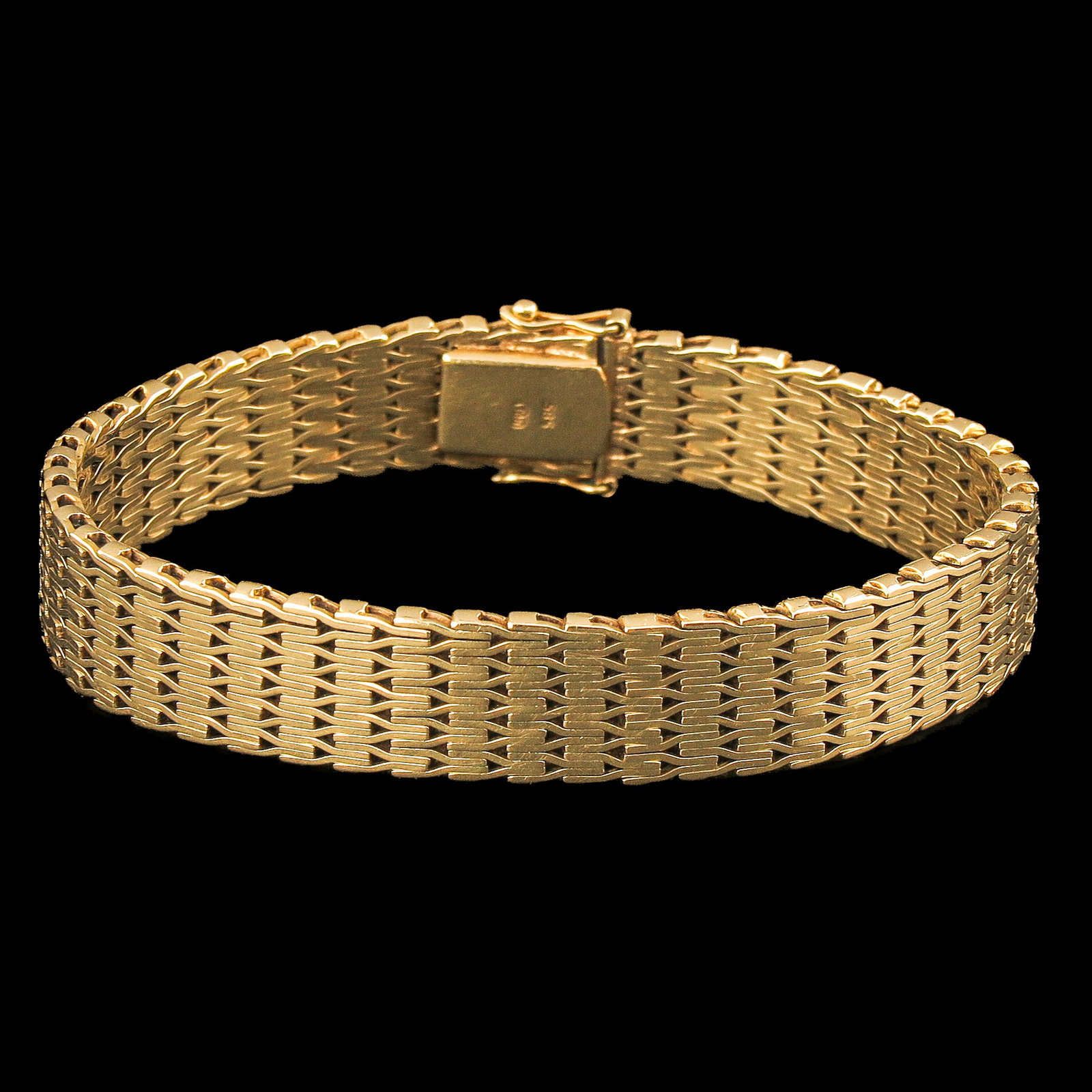 A 14KG Bracelet: 14 Krt. gold, width 11 mm, length 18 cm