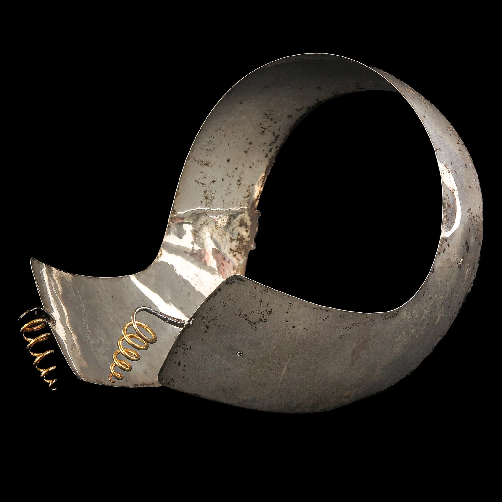 A Dutch Oorijzer: silver, with 18 Krt. gold curls, Kampereiland