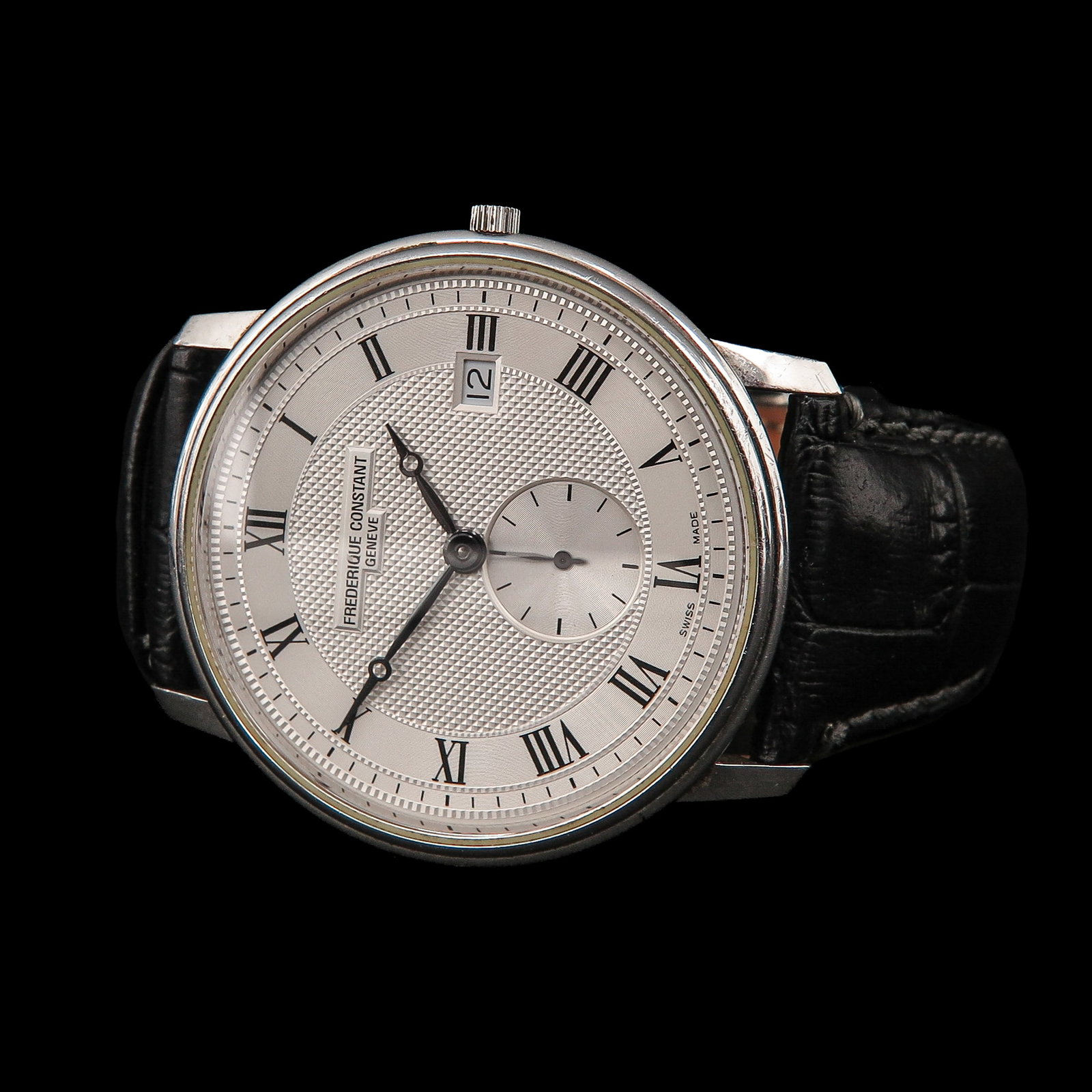 A Mens Watch: Frederique Constant, quartz, steel, with black leather strap, case diameter 40 mm