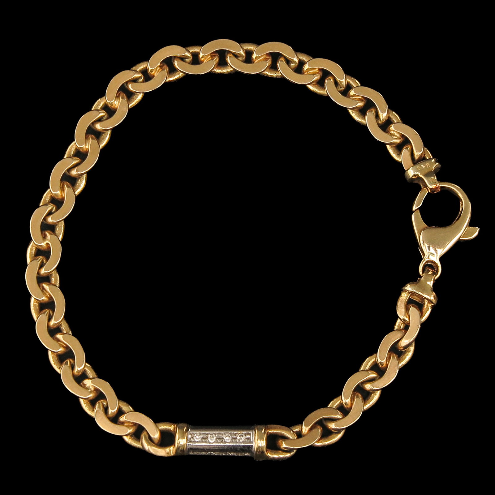 A 14KG Bracelet: 14 Krt. gold, with flat links, with an intermediate link set with 4 diamonds, length 17 cm