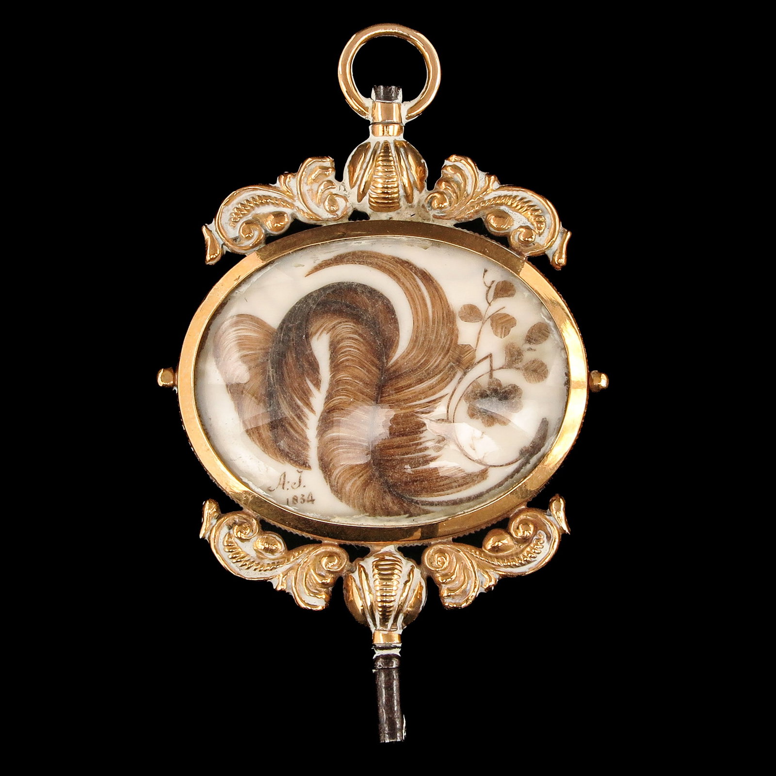 A 14KG Watch Key: 14 Krt. gold, with hairpiece, length 67 mm