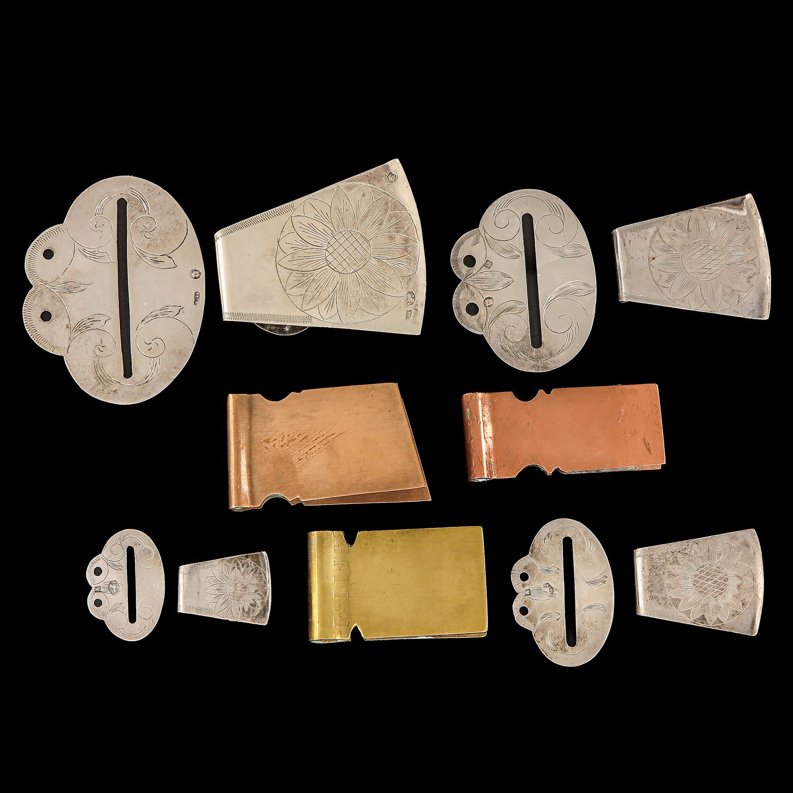 A Group of Faaljehaken: Faaljehaken, silver and brass