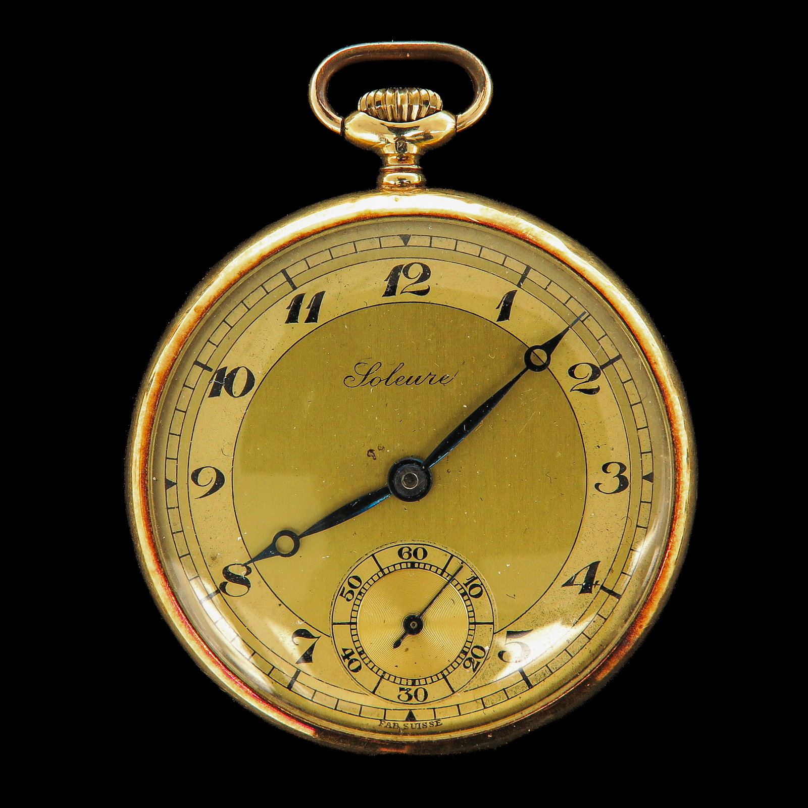 A 14KG Pocket Watch: 14 Krt. gold, signed dial Soleure, diameter 47 mm