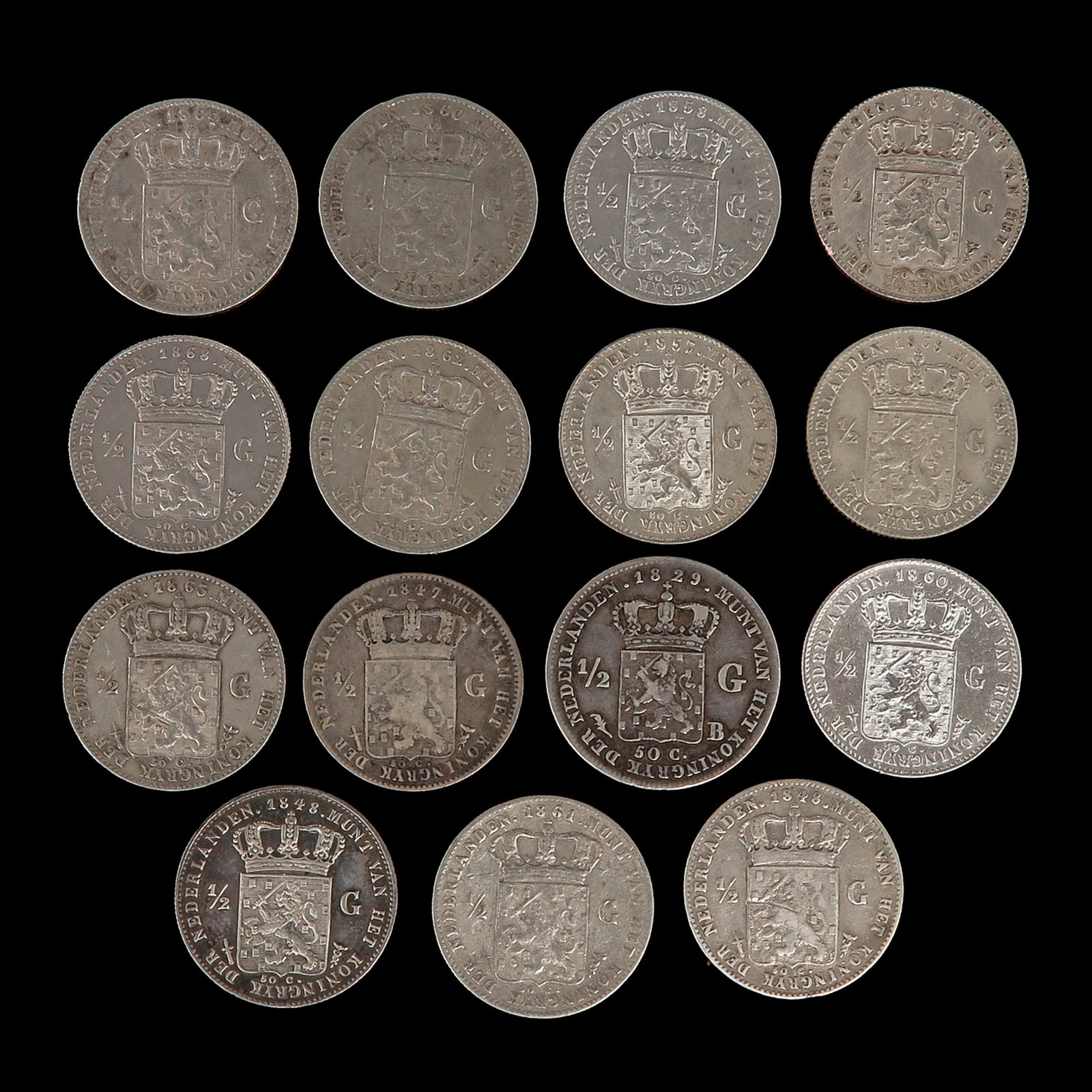 A Gorup of Silver Coins: silver coins, including 1/2 guilder 1848