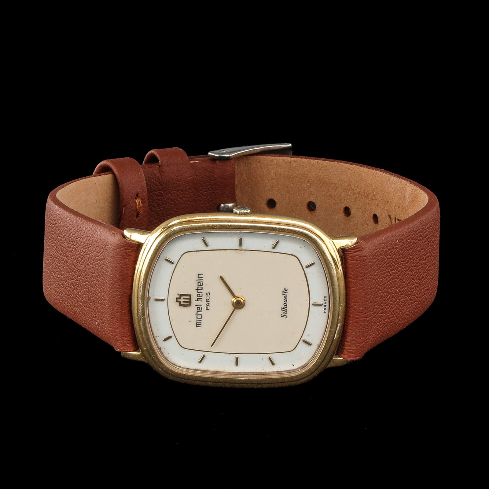 A Mens 14KG Watch: 14 Krt. gold signed Michel Herbelin, Paris, case 27 x 31 mm