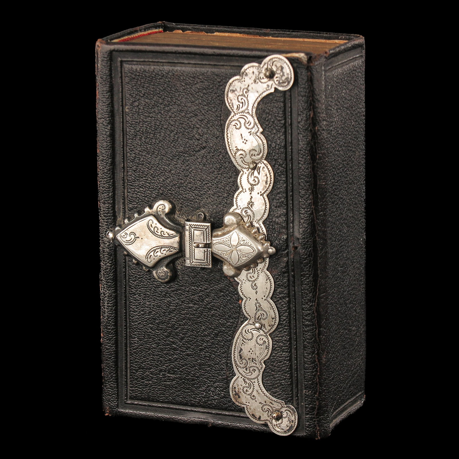A Bible with Silver Fittings: with silver fittings and clasp, 5 x 13 x 8 cm