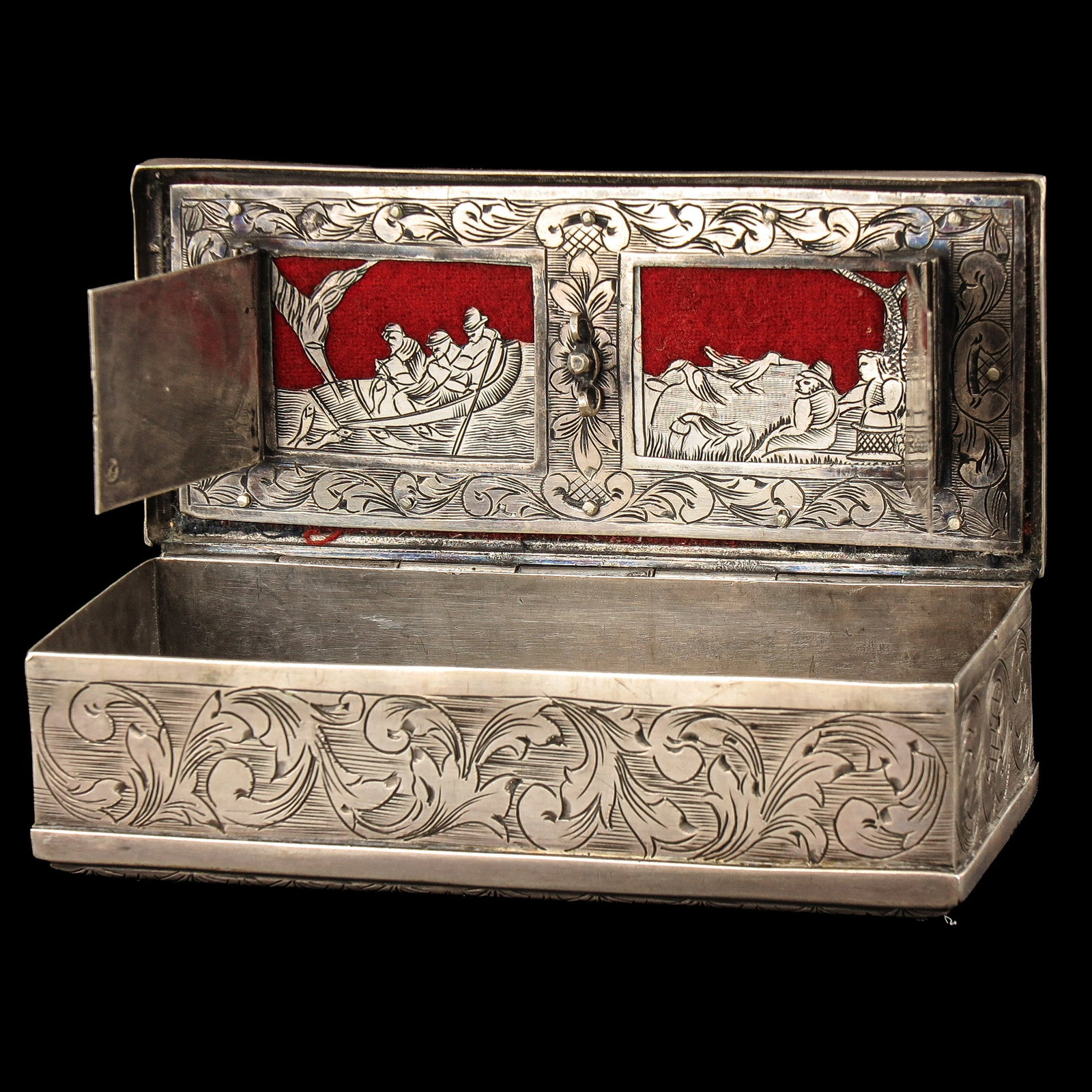 A Silver Tobacco Box: silver, with drawers and windows, Amsterdam hallmarked, with, among others, biblical depictions and the 4 seasons, length 12 cm