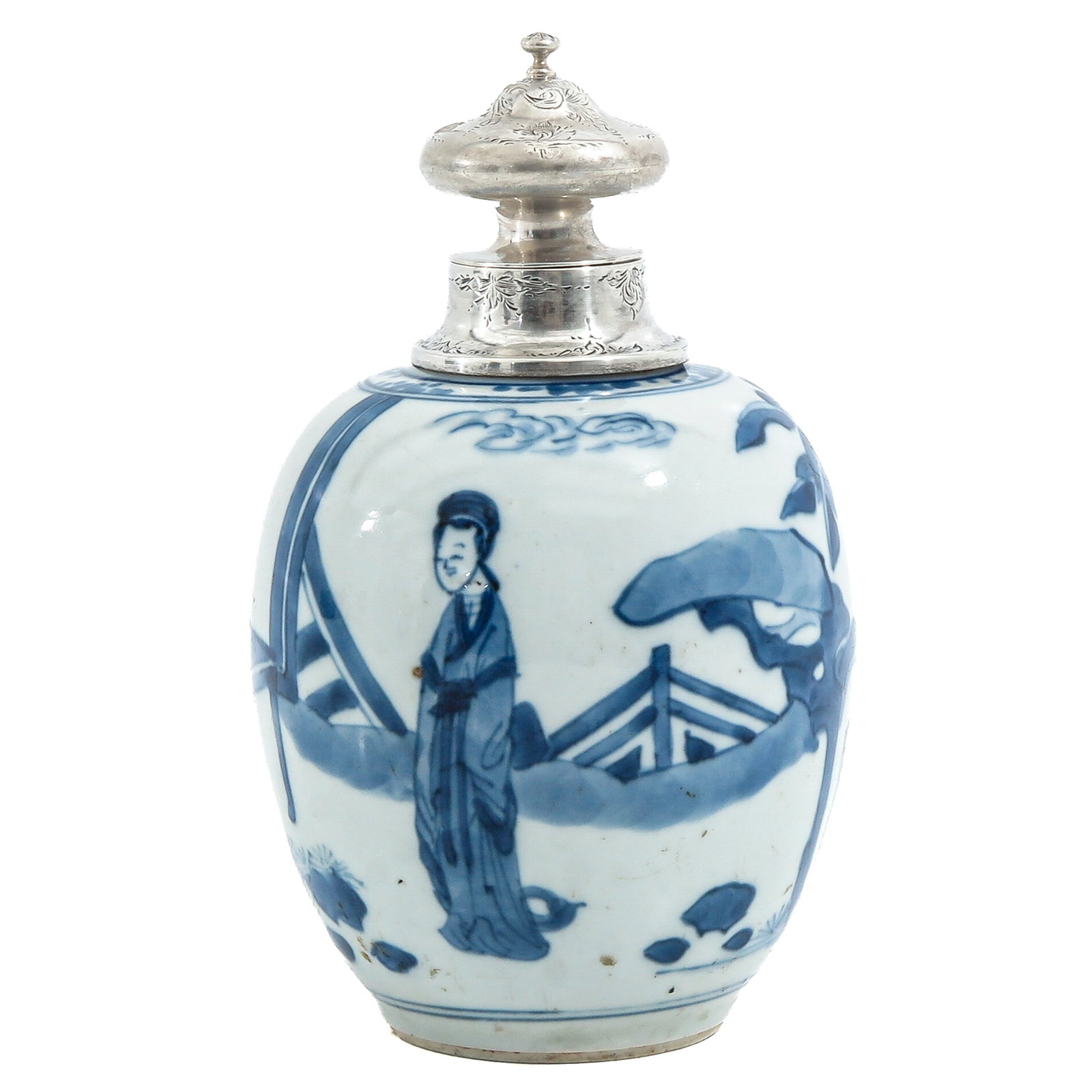 A Blue and White Tea Caddy: Decorated with standing figures in a landscape, fitted with silver mount and cover, Kangxi Period, 17 cm tall.