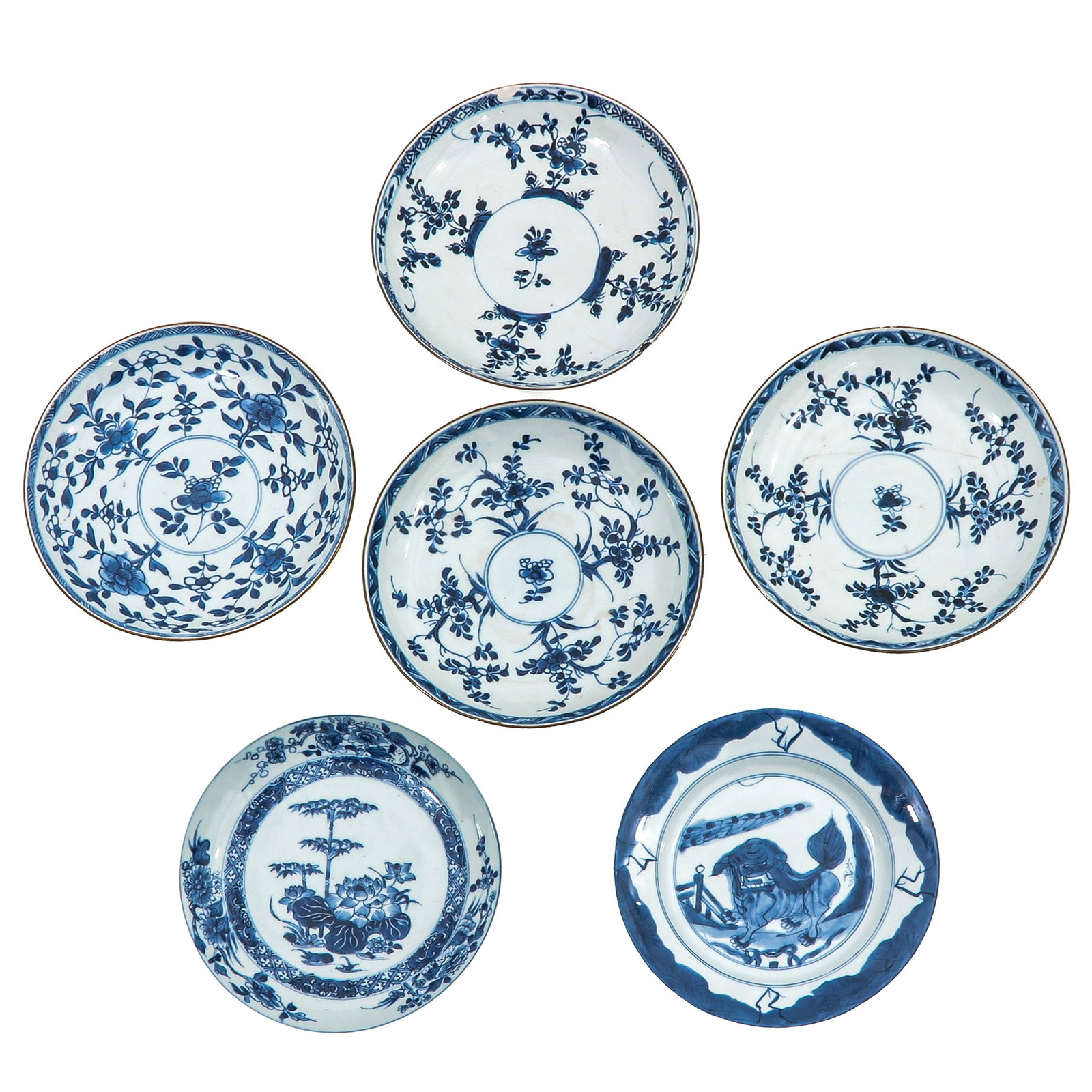 A Group of 6 Blue and White Plates: In a variety of scenes, with floral motifs and garden scenes, 22 cm in diameter, including 18th Century, chip and hairline.