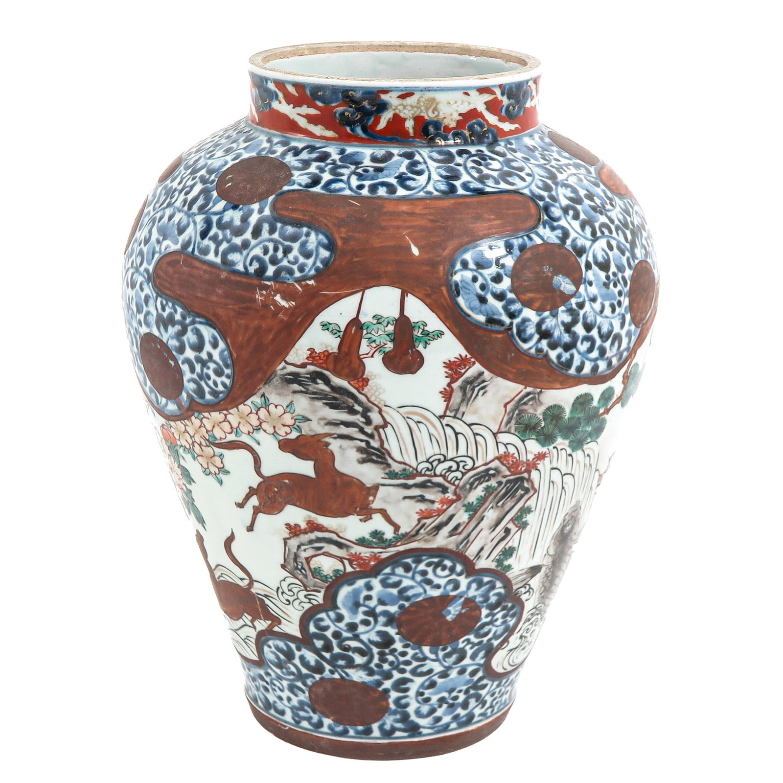 An Arita Vase: 17th Century, blue scrolling ground decorated with landscapes and animals, 38 cm tall.