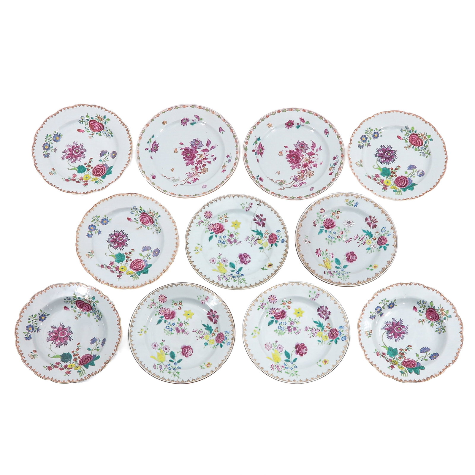 A Group of Famille Rose Plates: Decorated in floral sprays and scattered blossoms, 23 cm in diameter, 18th Century, in diverse conditions.