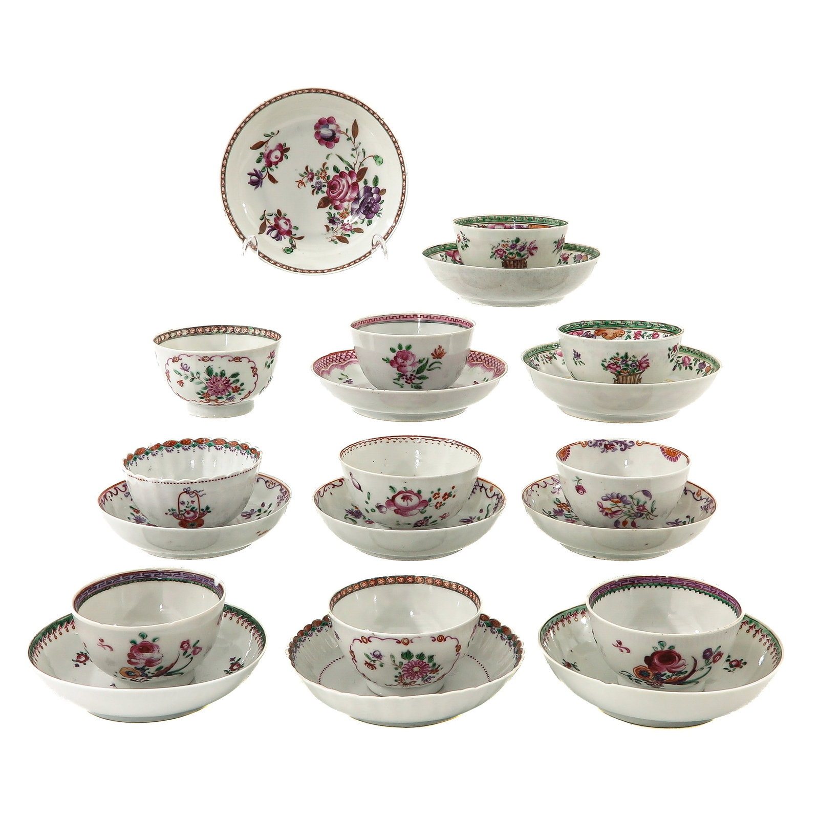 A Group of Famille Rose Cups and Saucers: Floral decoration, 18th Century, chip and hairline.