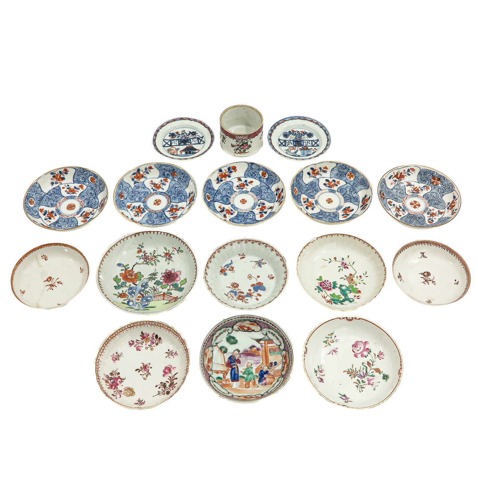 A Large Group of Porcelain: Including saucers in a variety of decors in addition to a small round box, including 18th Century, largest saucer is 14 cm in diameter, in diverse conditions.