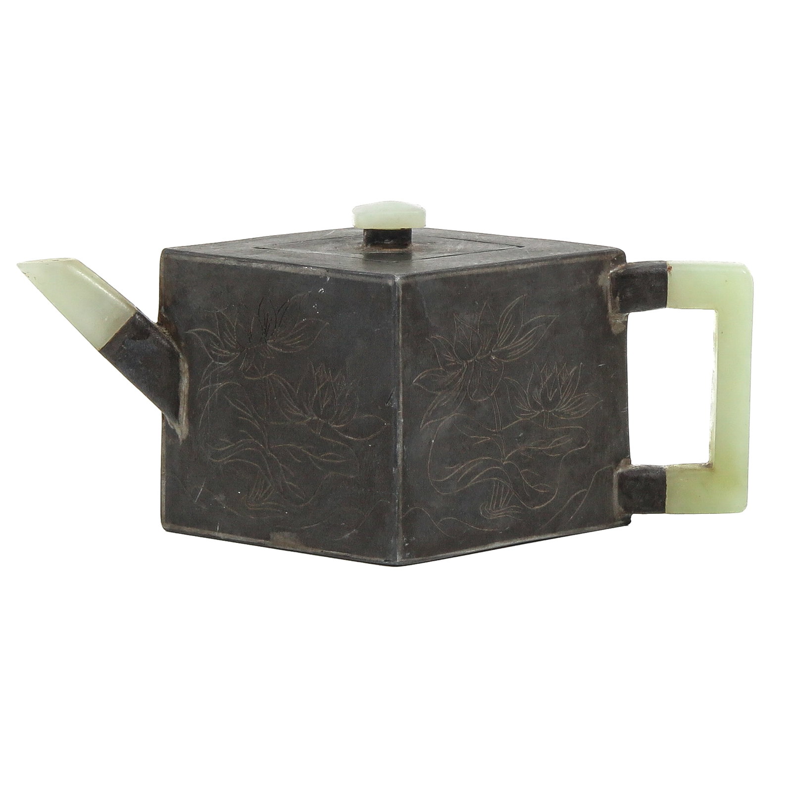 A Pewter and Jade Teapot: With engraved floral decoration, fitted jade spout, handle and finial, 19th Century, 8 cm tall.