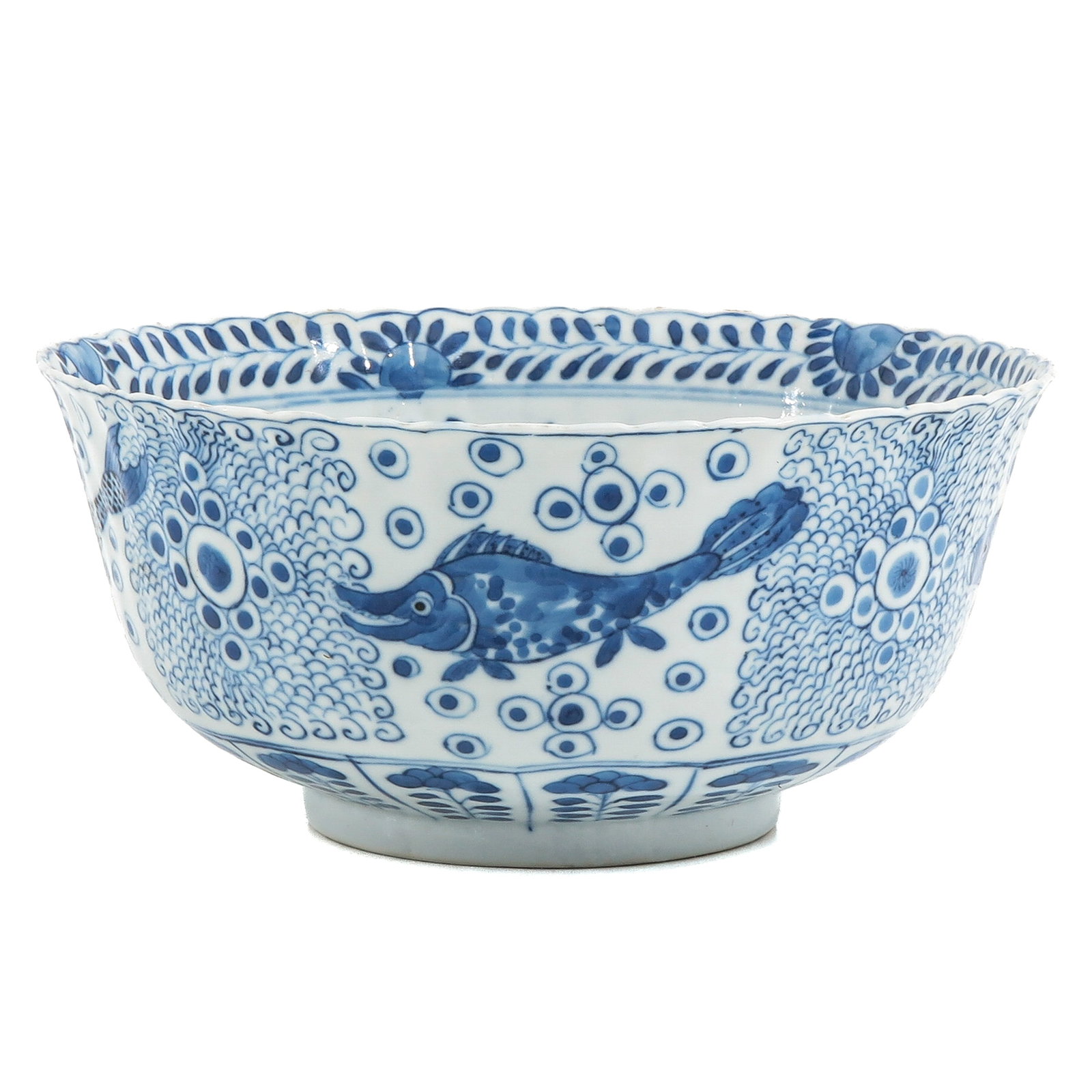 A Blue and White Bowl: Decorated with underglaze blue with crabs and perch among floral motif, Kangxi mark, 20 cm in diameter.