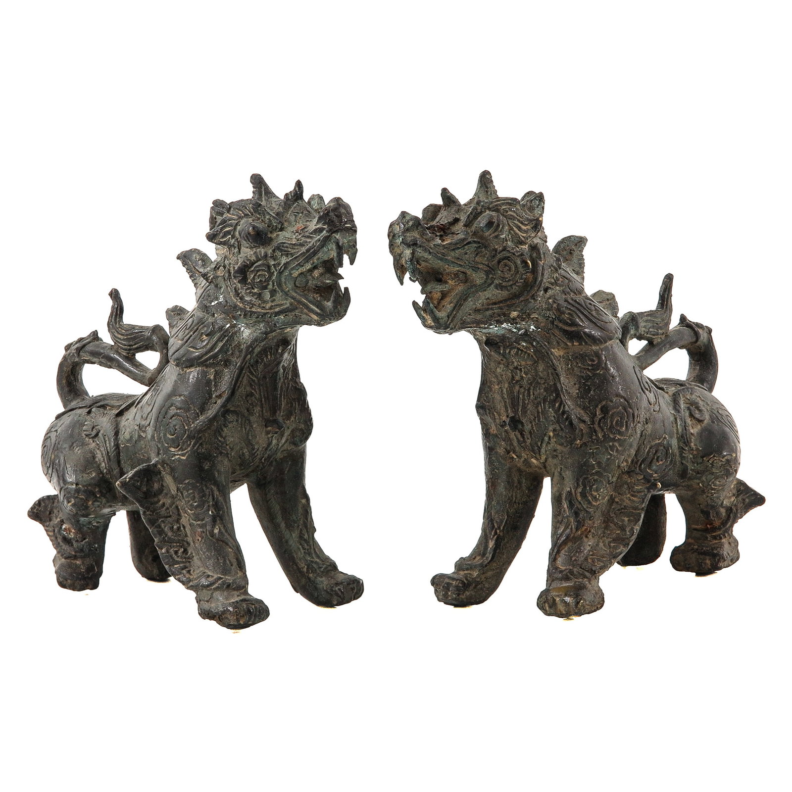 A Pair of Bronze Temple Lions: China, 19 cm tall.