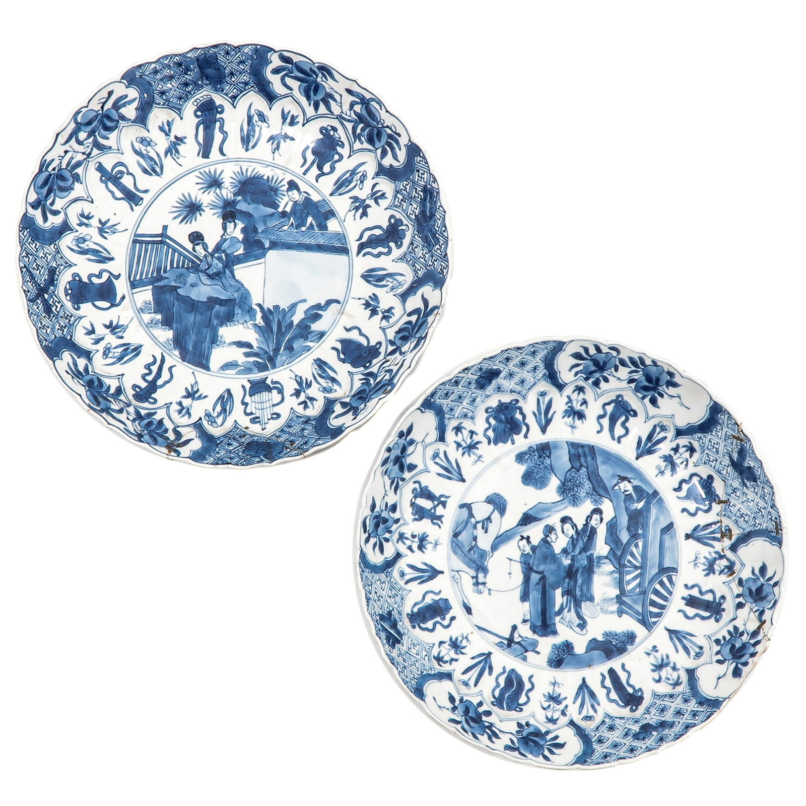 A Lot of 2 Blue and White Plates: Decorated with figures in landscape with wide borders of flowers and antiquities, Kangxi Period, 27 cm in diameter, with restorations.