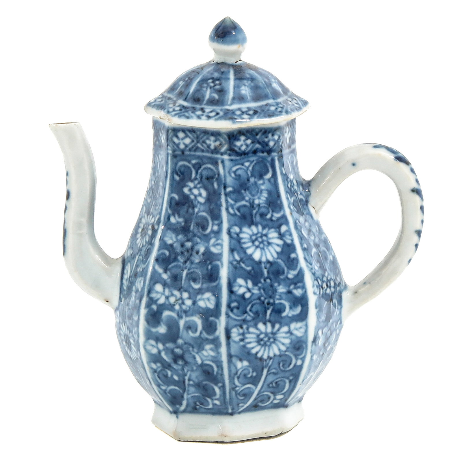 A Blue and White Teapot: Eight sides fully decorated with flowers, 18th Century, 12 cm tall.