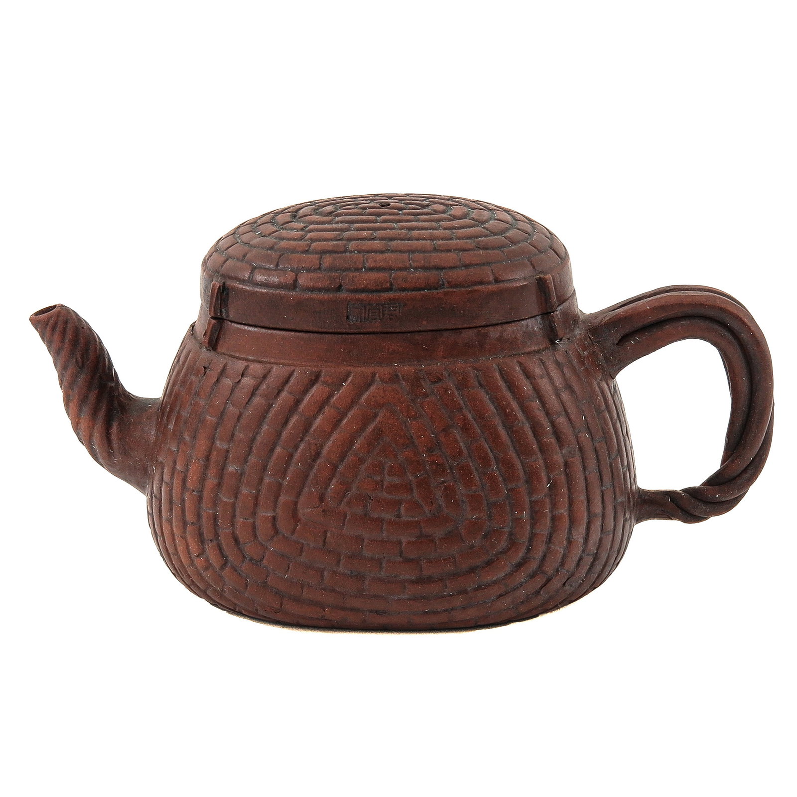 A Yixing Teapot: Relief pattern on teapot and cover, seal mark on rim of teapot, 9 cm tall.
