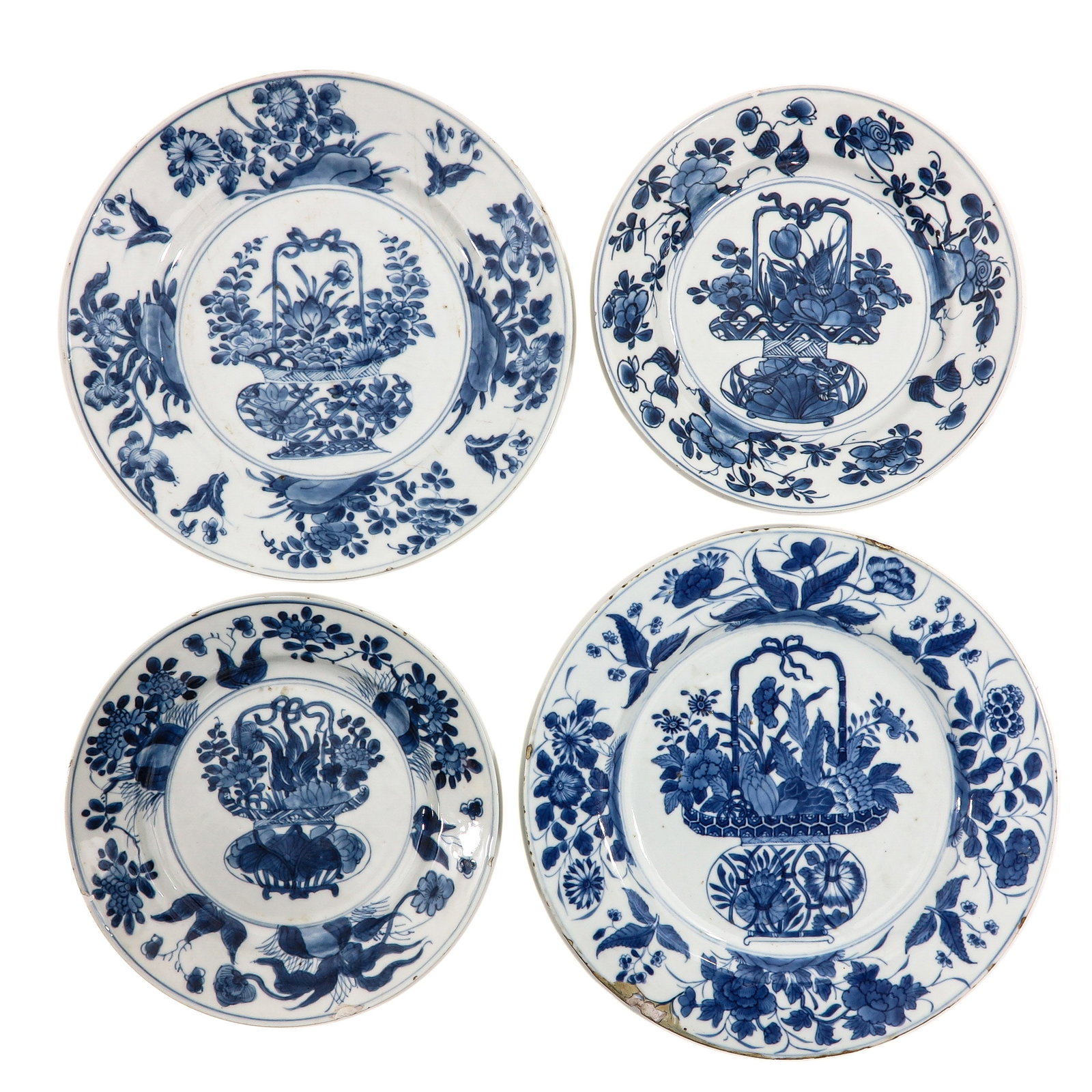 A Collection of 4 Blue and White Plates (1 of 6)