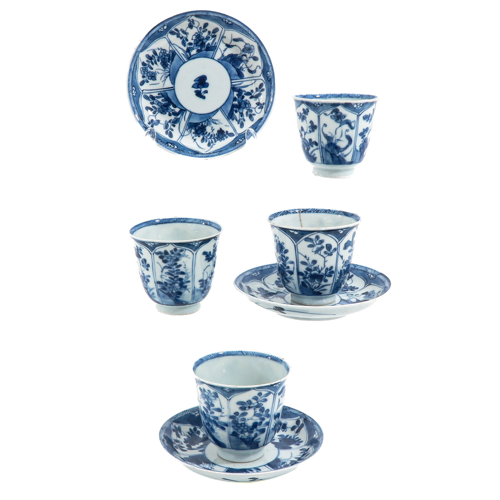 A Set of Blue and White Cups and Saucers: Decorated with floral motifs and paneled design, saucers are 13 cm in diameter, in diverse conditions.