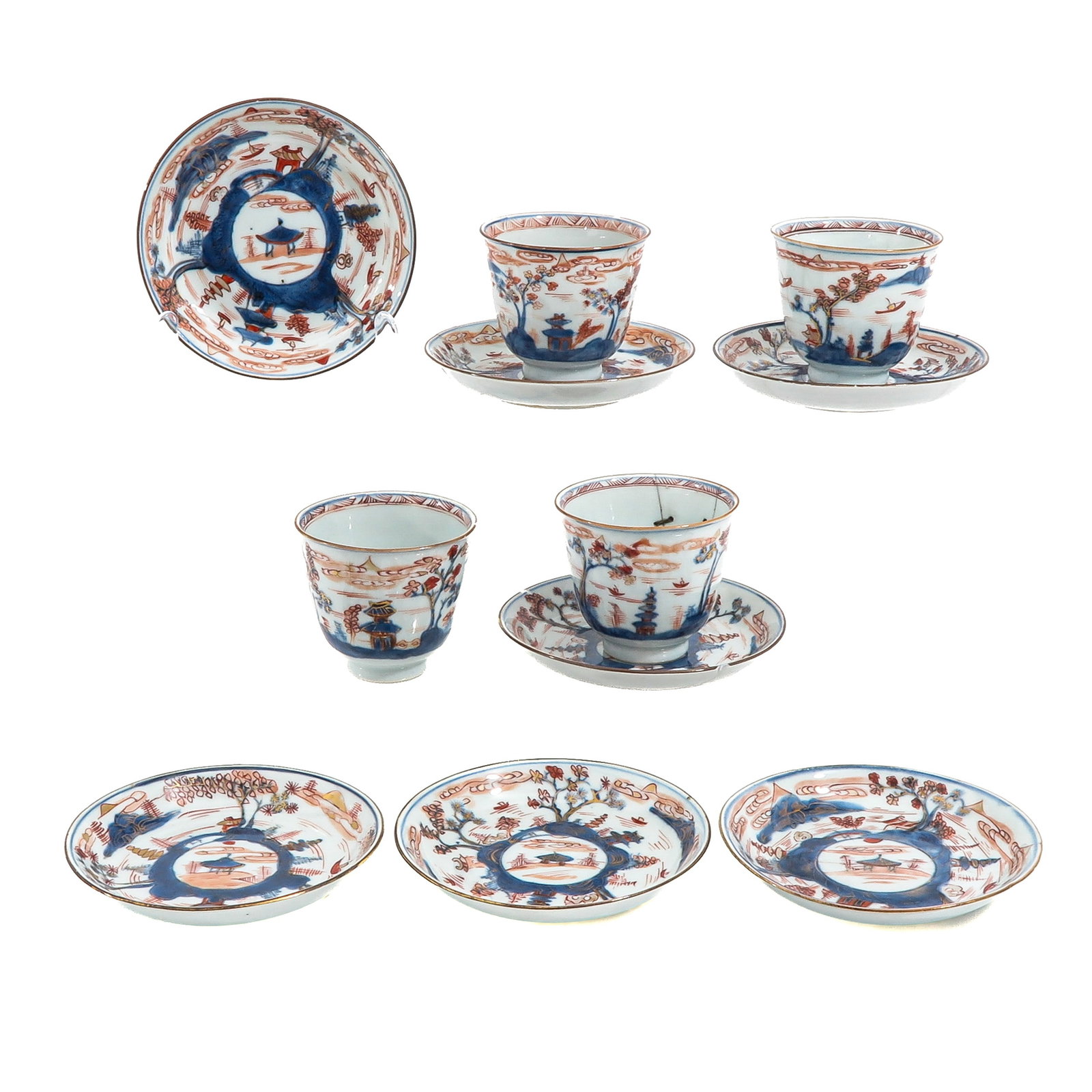 A Group of Imari Cups and Saucers: Decorated with pagodas, flowering trees and landscapes, 18th Century, saucers are 13 cm in diameter, in diverse conditions.