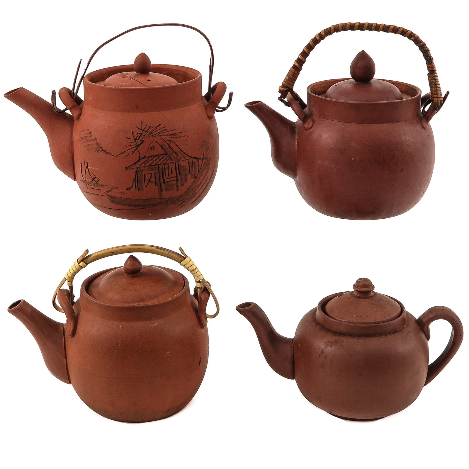 A Group of 4 Yixing Teapots: In a variety of decors and sizes, tallest teapot is 14 cm