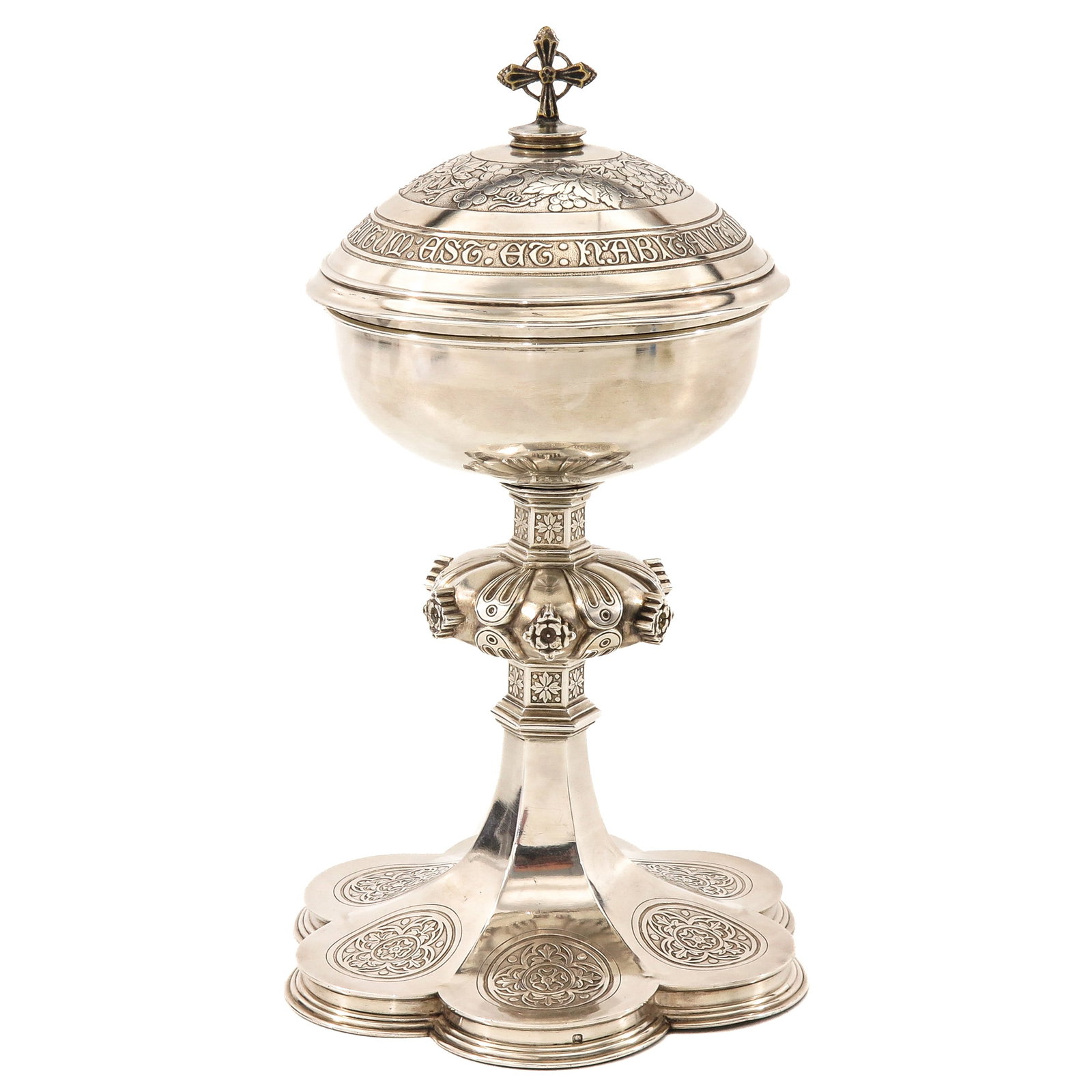 A Silver Ciborium by silversmith Placide-Poussielgue Rusand: silver, marked with Minerva and also in the base, maker's mark Placide-Poussielgue Rusand (1824-1889), France, richly decorated, lid with cross finial, height 26 cm.