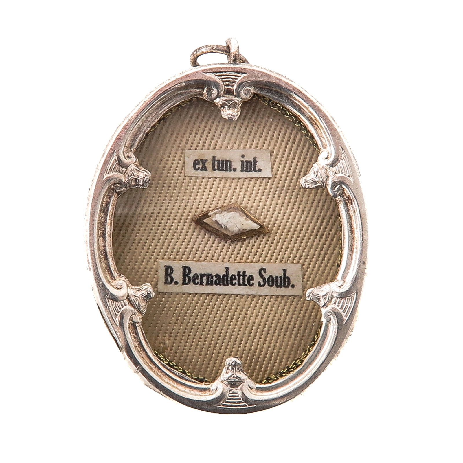 Sealed Theca: silver, containing relic ex tunica interiori of Saint Bernadette Soubirous (visionary of Lourdes), length 4 cm., you are purchasing the case, the relics are a gift
