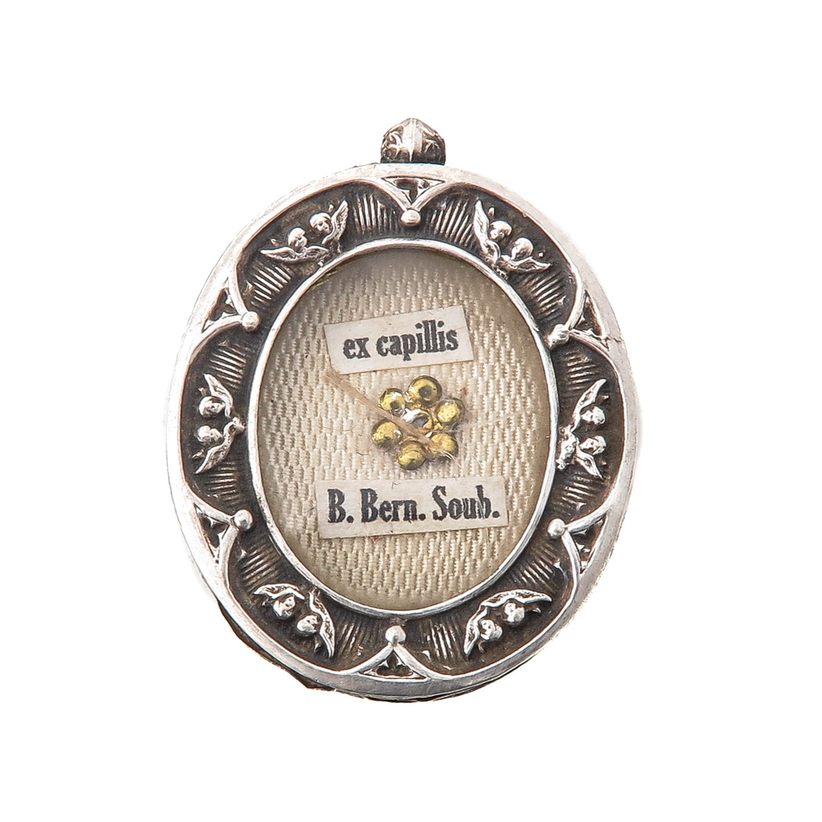 Sealed Theca: silver, containing an ex capillis relic of Saint Bernadette Soubirous (visionary of Lourdes), length 3.5 cm., you are purchasing the case, the relics are a gift
