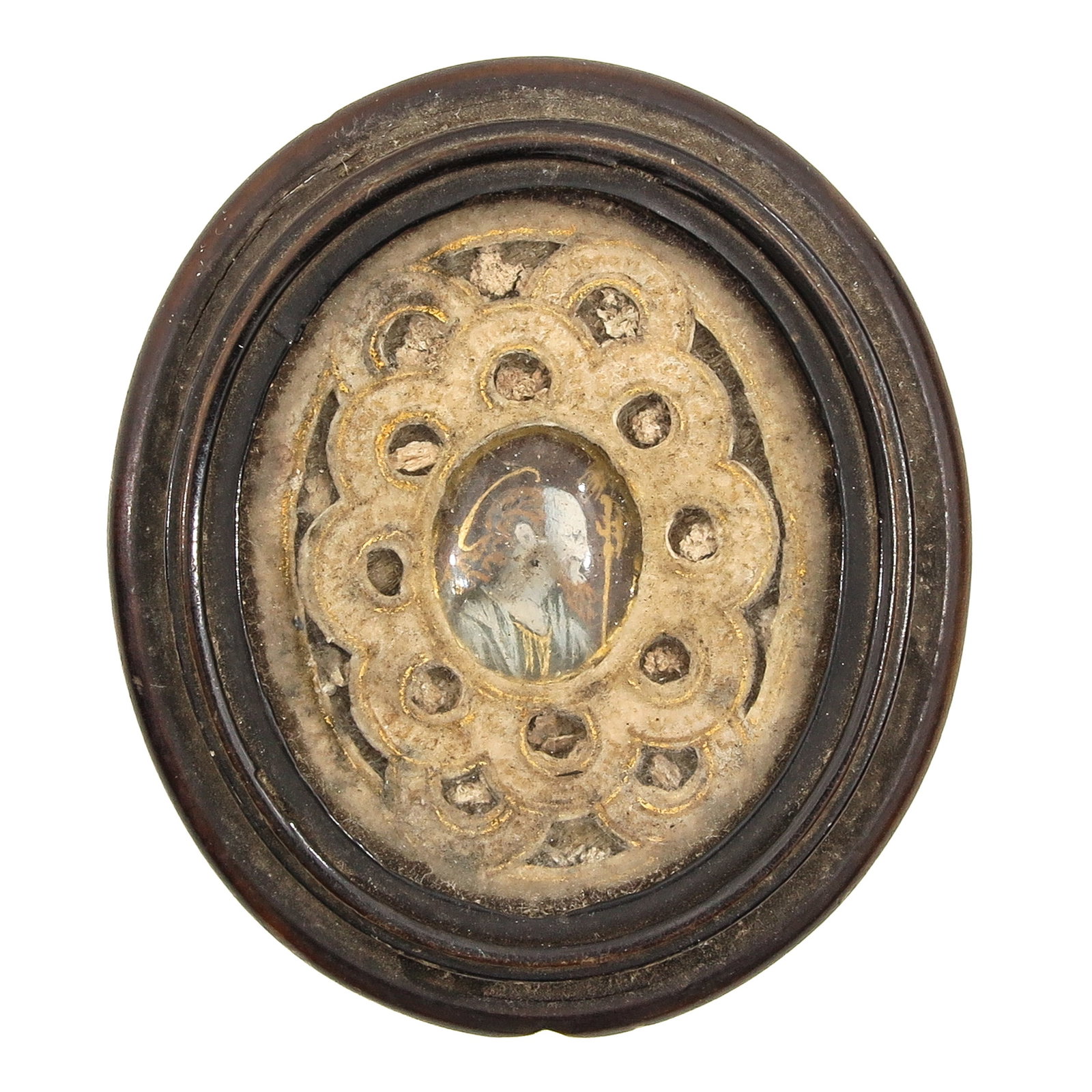 Sealed Theca: 18th century, with several small relics, one side with painting on enamel, the reverse side with a print of Saint Ignatius of Loyola, length 5.5 cm., you are purchasing the case, the relics are a gift