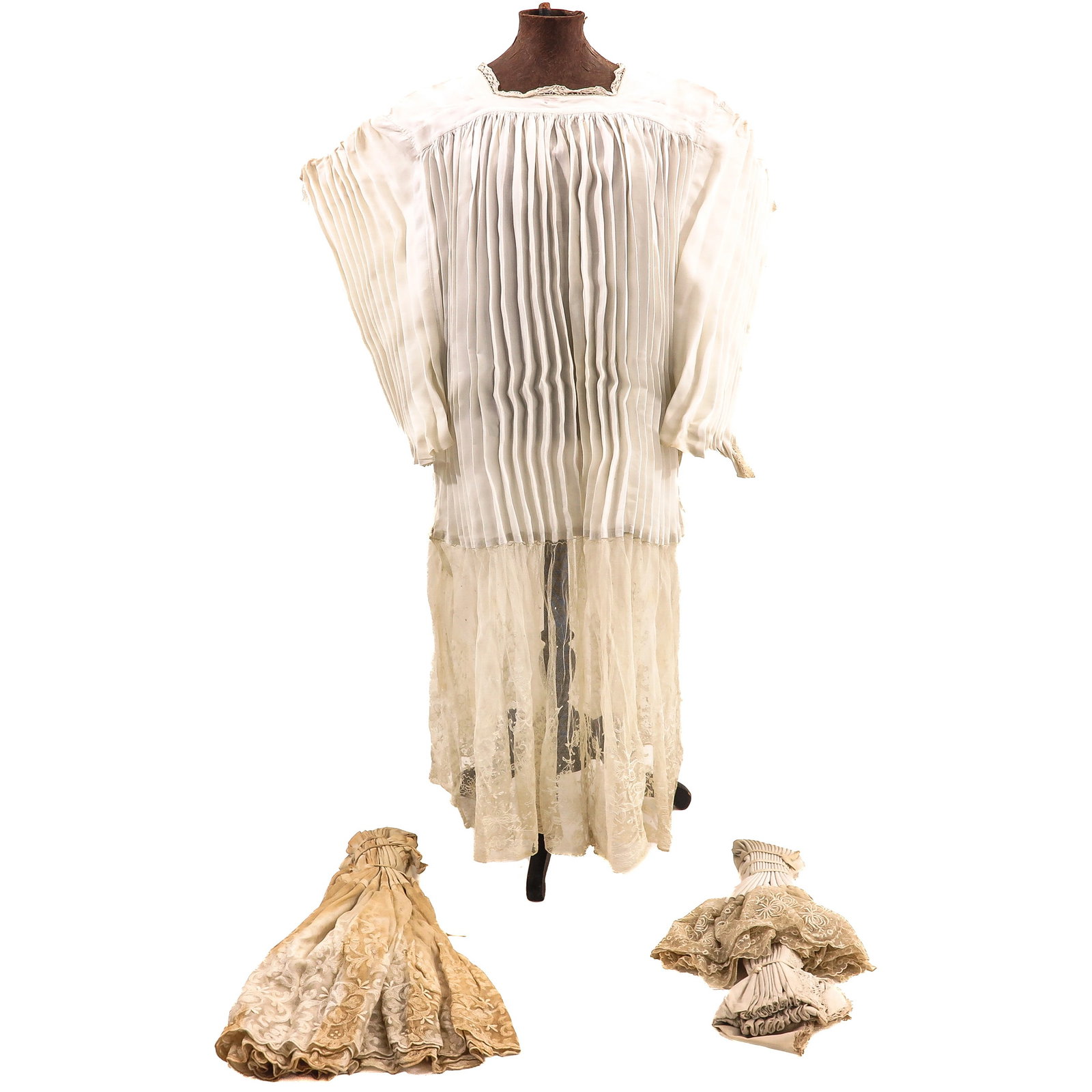 A Beautiful Collection of Albs: of three priestly albs with exceptionally fine and richly worked Brussels/Bruges lace, 19th century