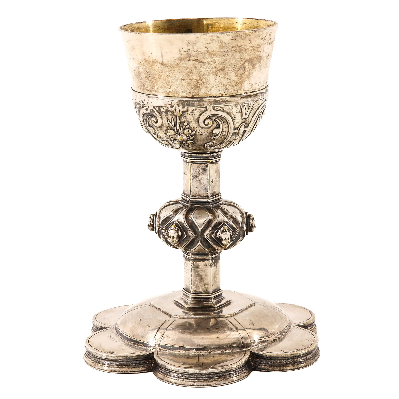 A 17th Century Solid Silver Ciborium: 17th century, solid silver with gilded cup, stem with 6 masks, possibly Sint-Truiden, 1640, height 19 cm.