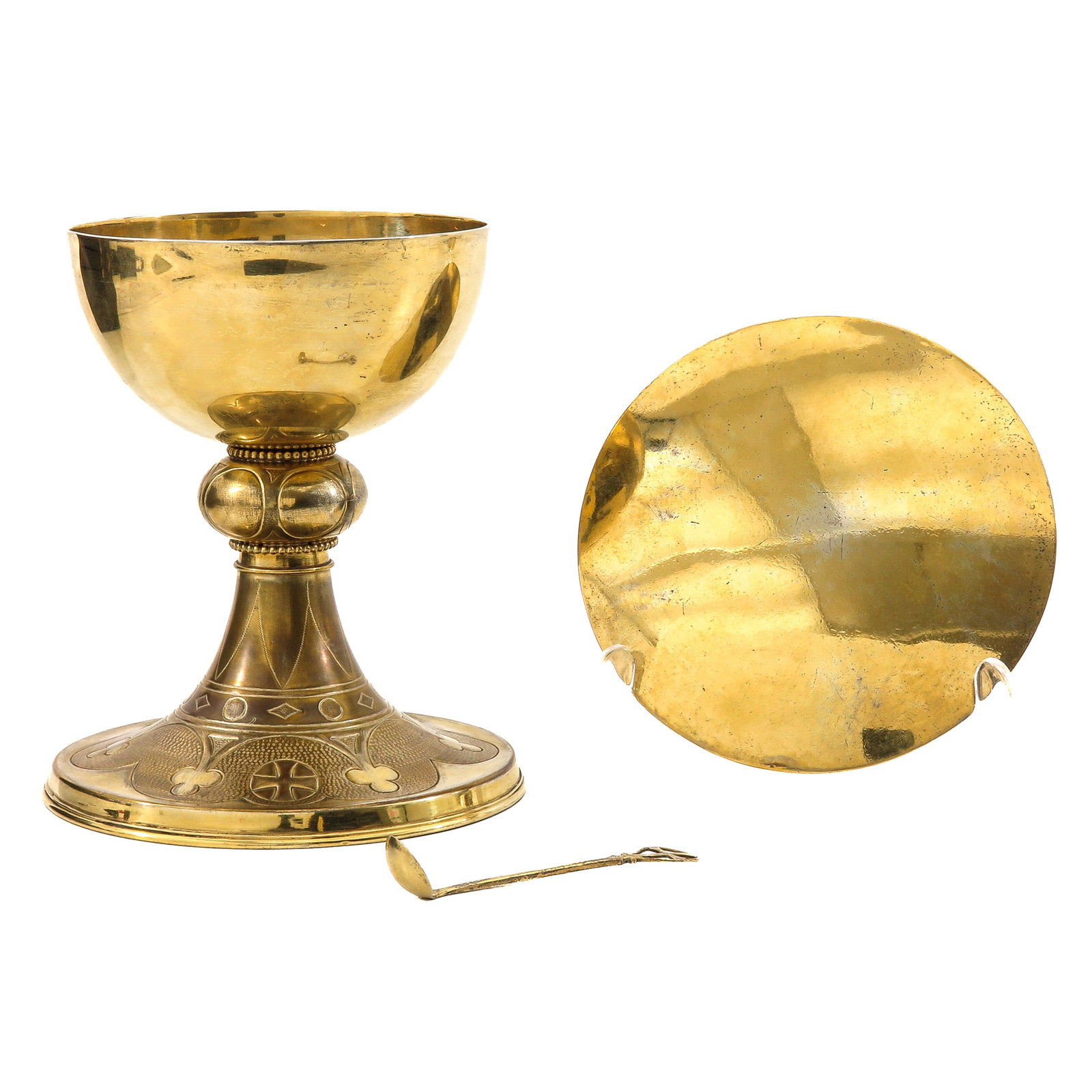 A Chalice in Original Box: with silver cup, paten, and spoon, in original box by C.H. de Vries, Amsterdam, height 16 cm.