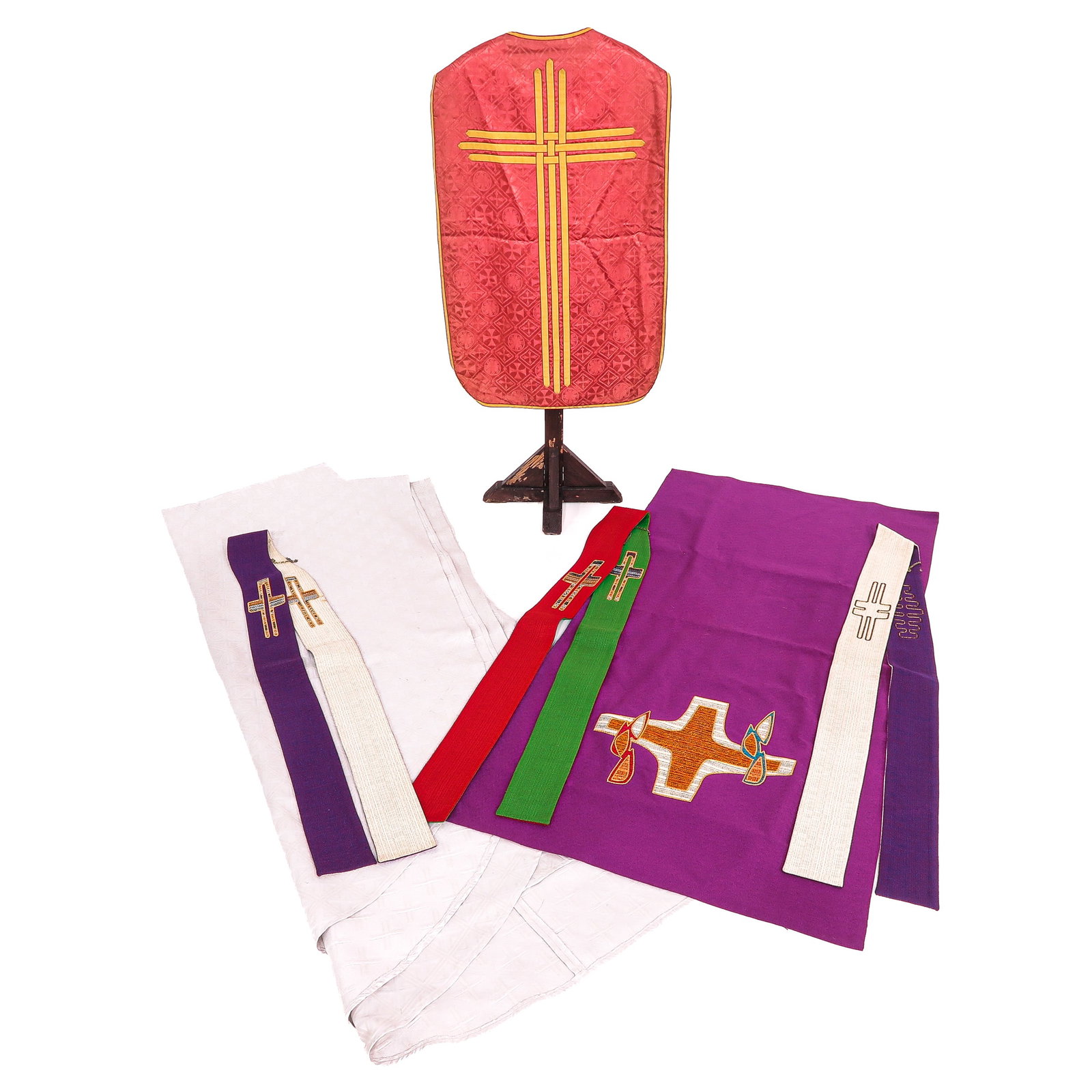 A Group of Liiturgical Vestments: consisting of 2 altar cloths, 3 stoles and a chasuble