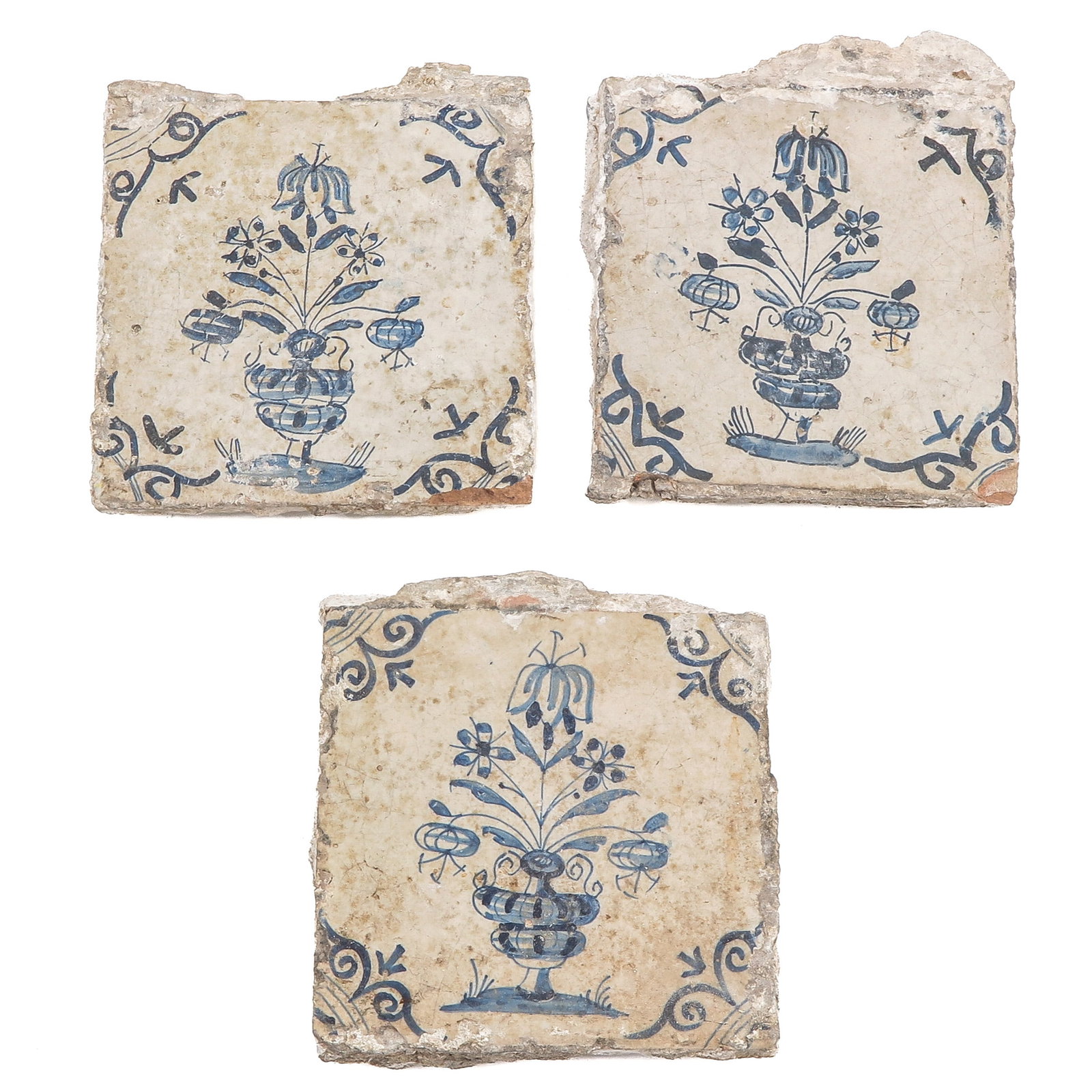 A Lot of Dutch Tiles: consisting of 3 Dutch tiles, with floral decoration, 13 x 13 cm.