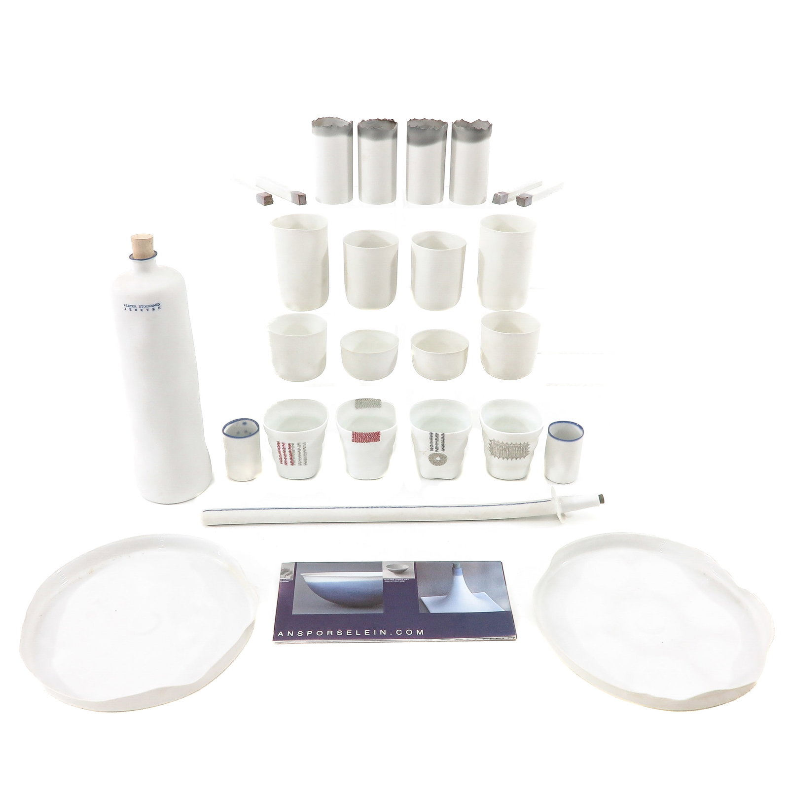 A Diverse Collection of Items: consisting of a collection of dishes and beakers by Piet Stockmans, longest object 41 cm.