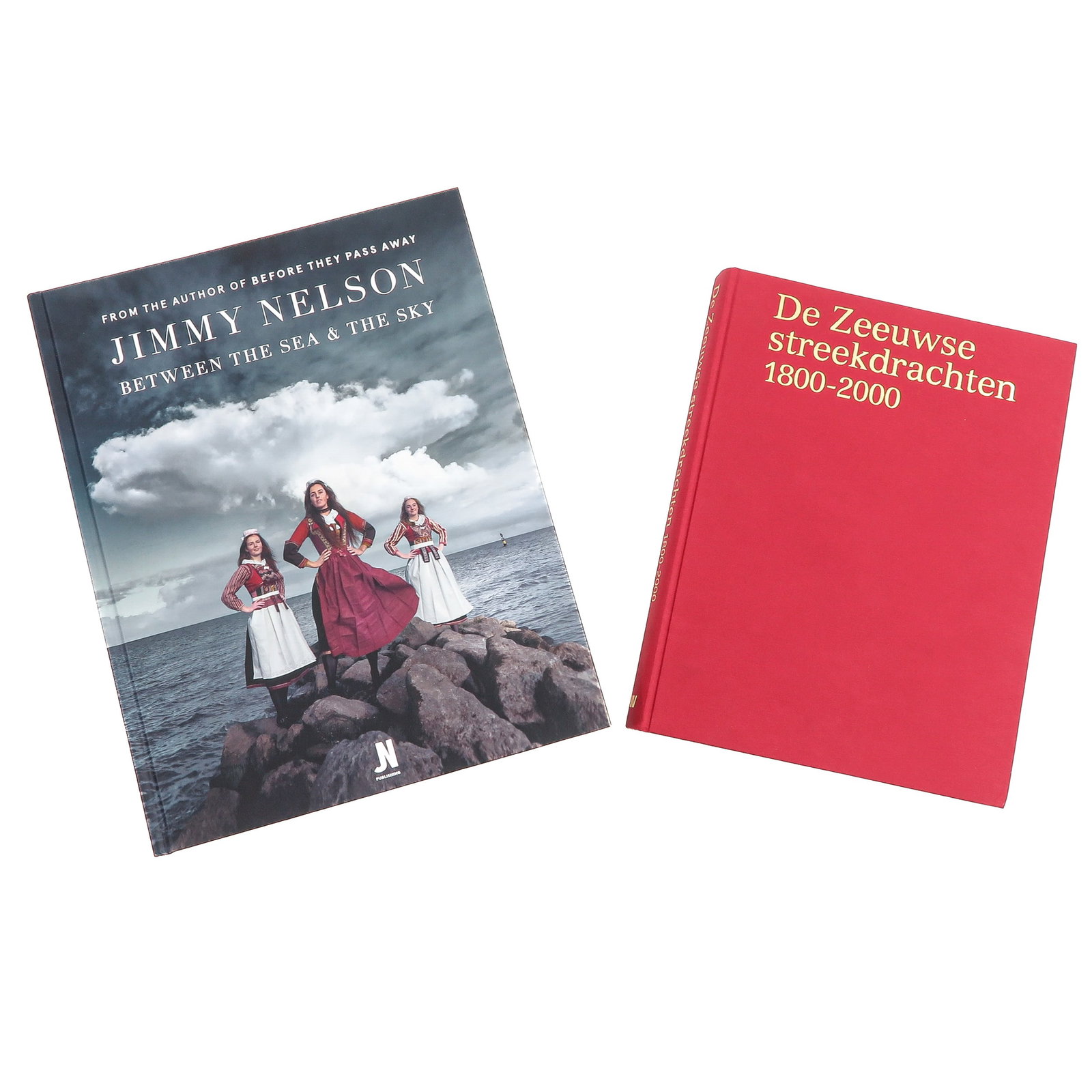 A Lot of Books: consisting of 2 books, Between the Sea & the Sky by Jimmy Nelson and De Zeeuwse streekdrachten 1800-2000