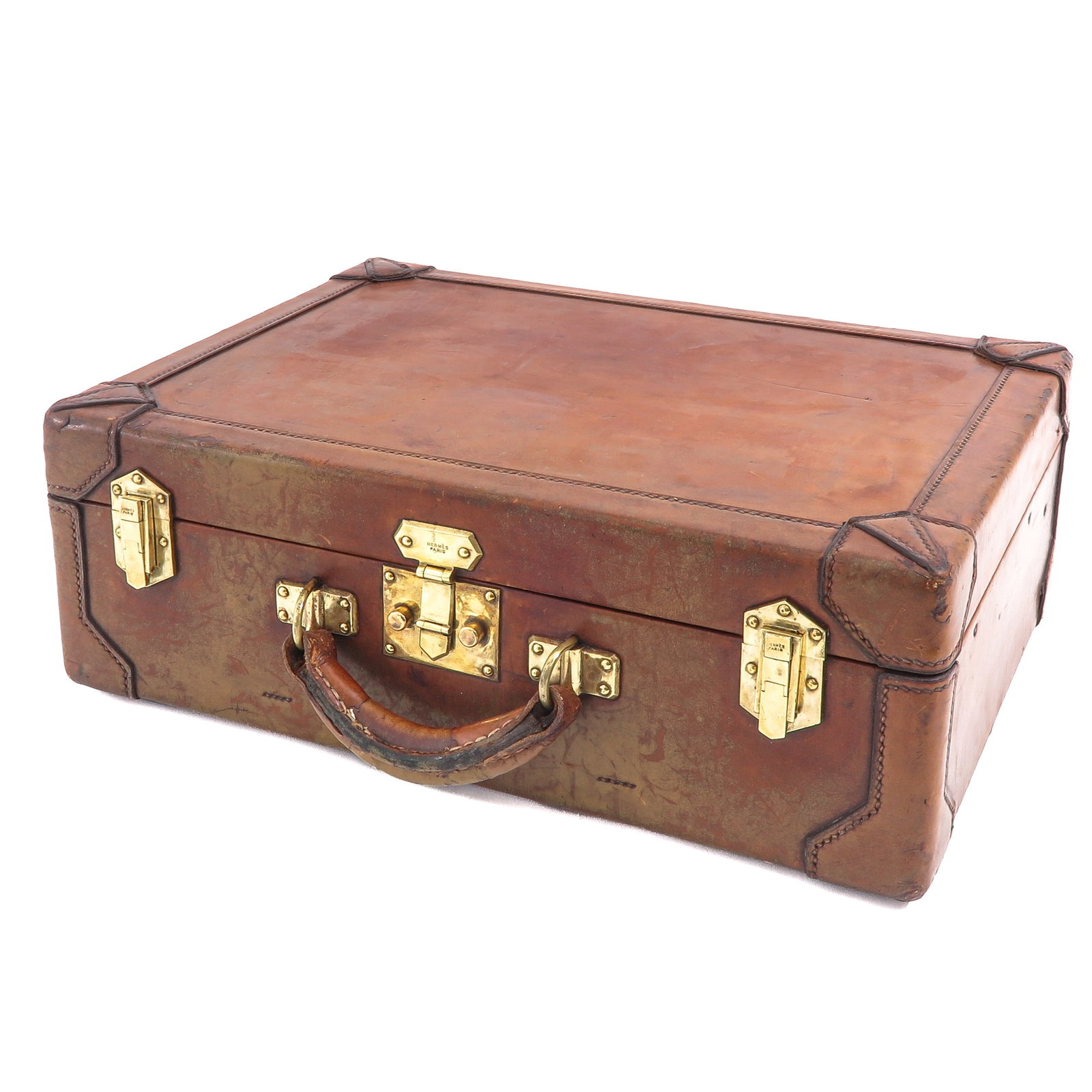A Hermes Suitcase: Hermes, leather with signed brass fittings, 45 x 16 x 33 cm.