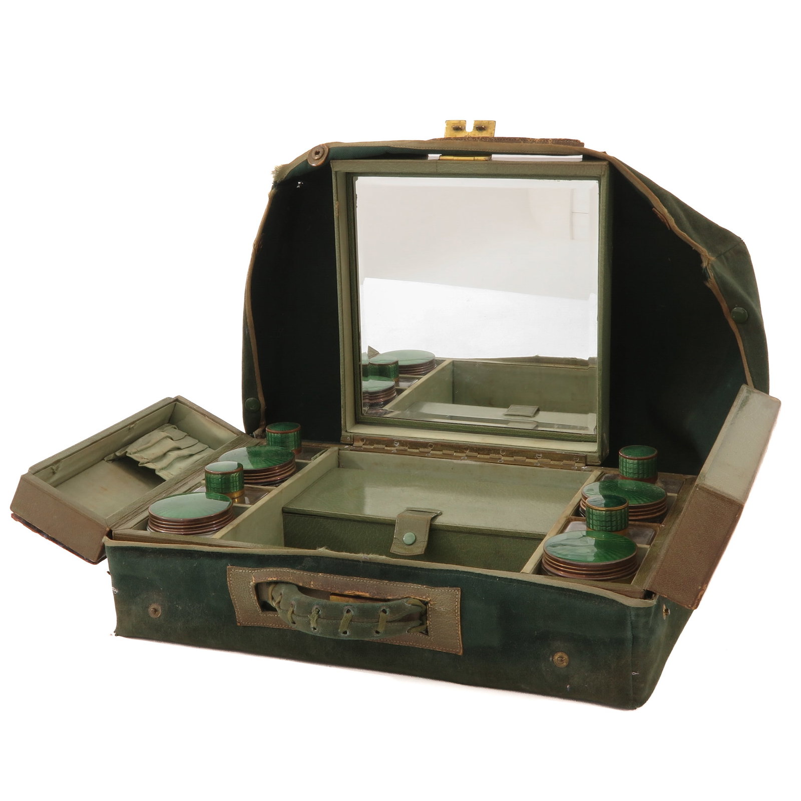 A Travel Case: with mirror and various green glass flacons and jars with green guilloch? enamelled lids, 38 x 11 x 30 cm.