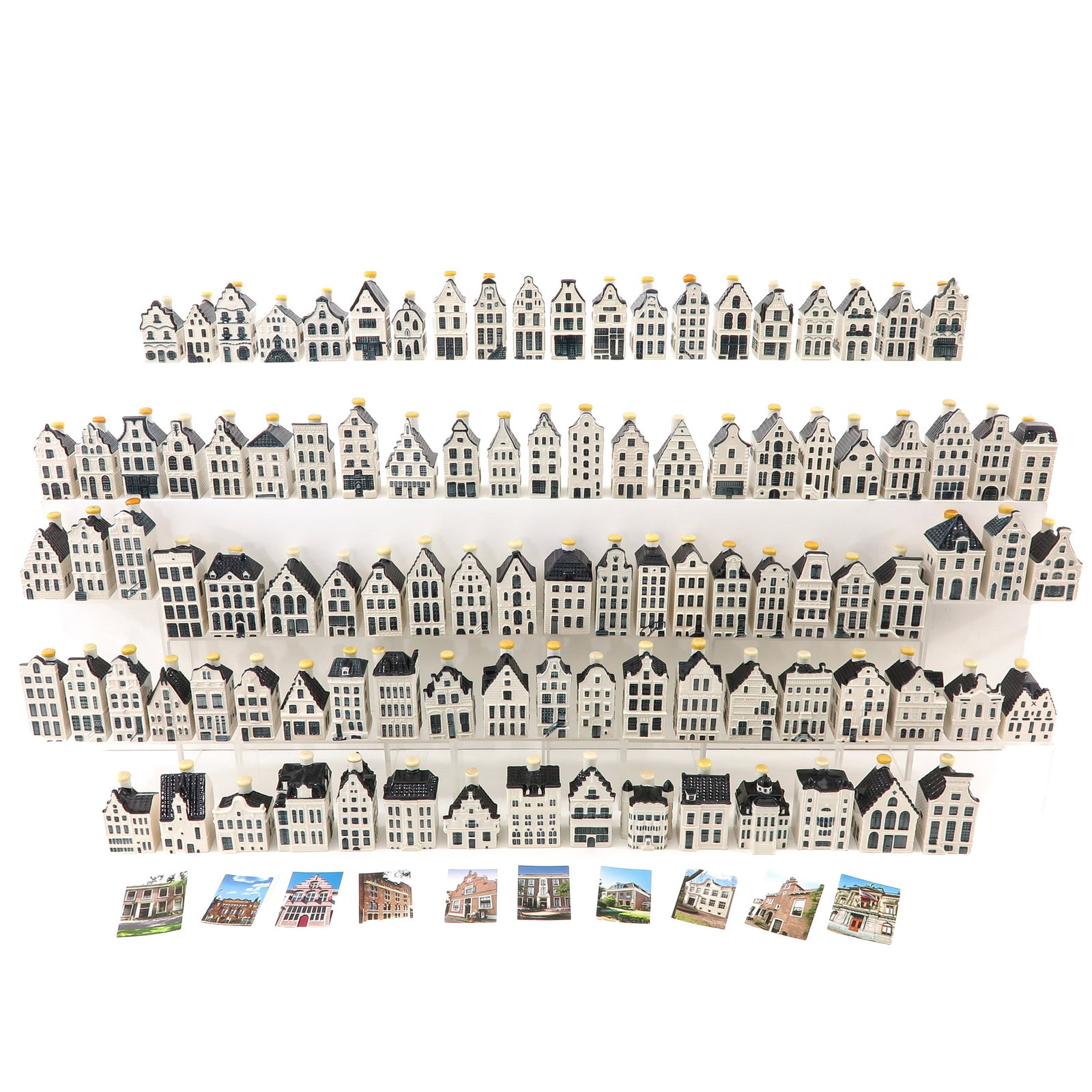 A Large Collection of KLM Houses: consisting of a large collection of KLM houses by Bols, Amsterdam, various models, tallest 11 cm.